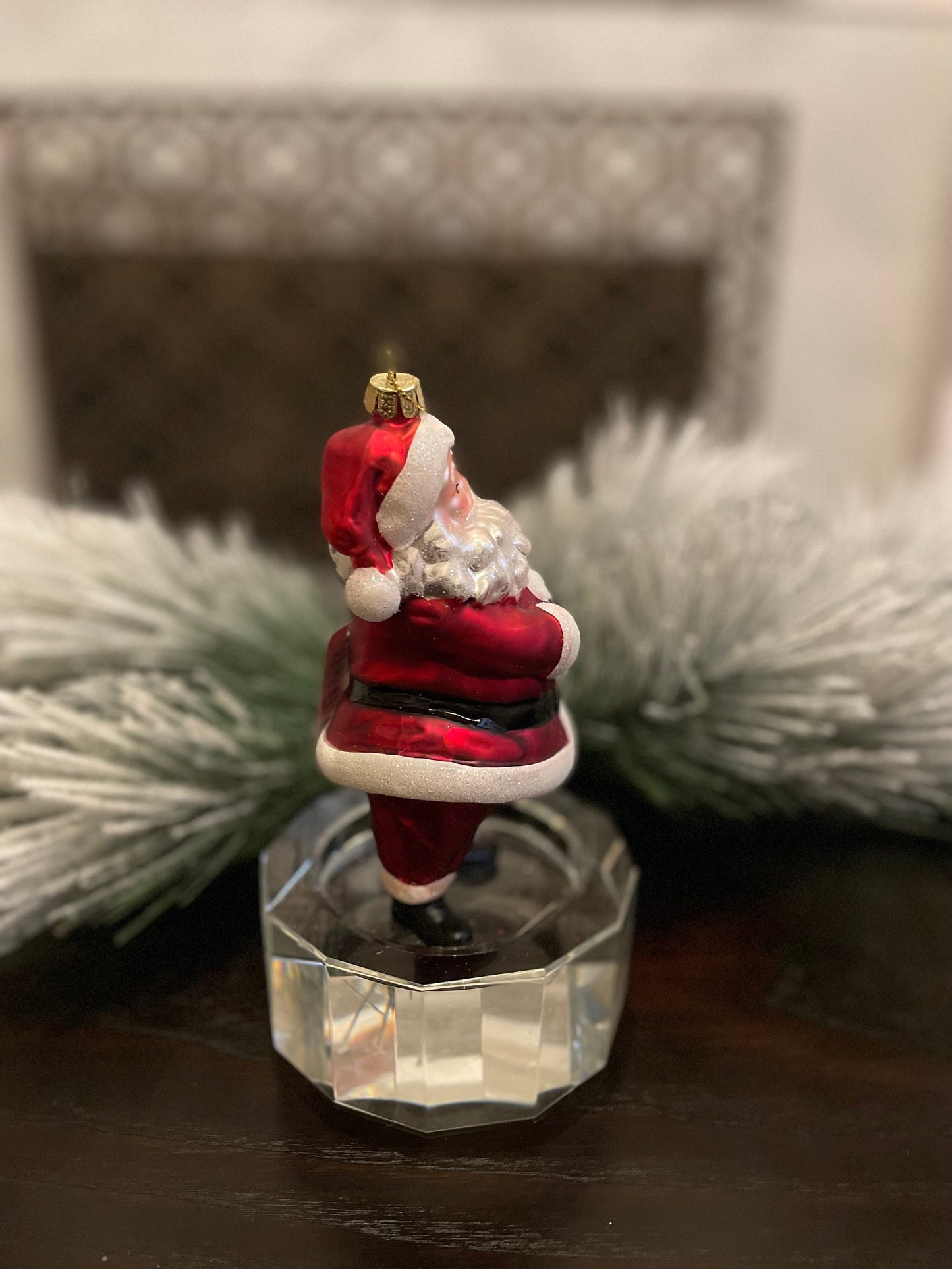 6" glass wink santa ornament.