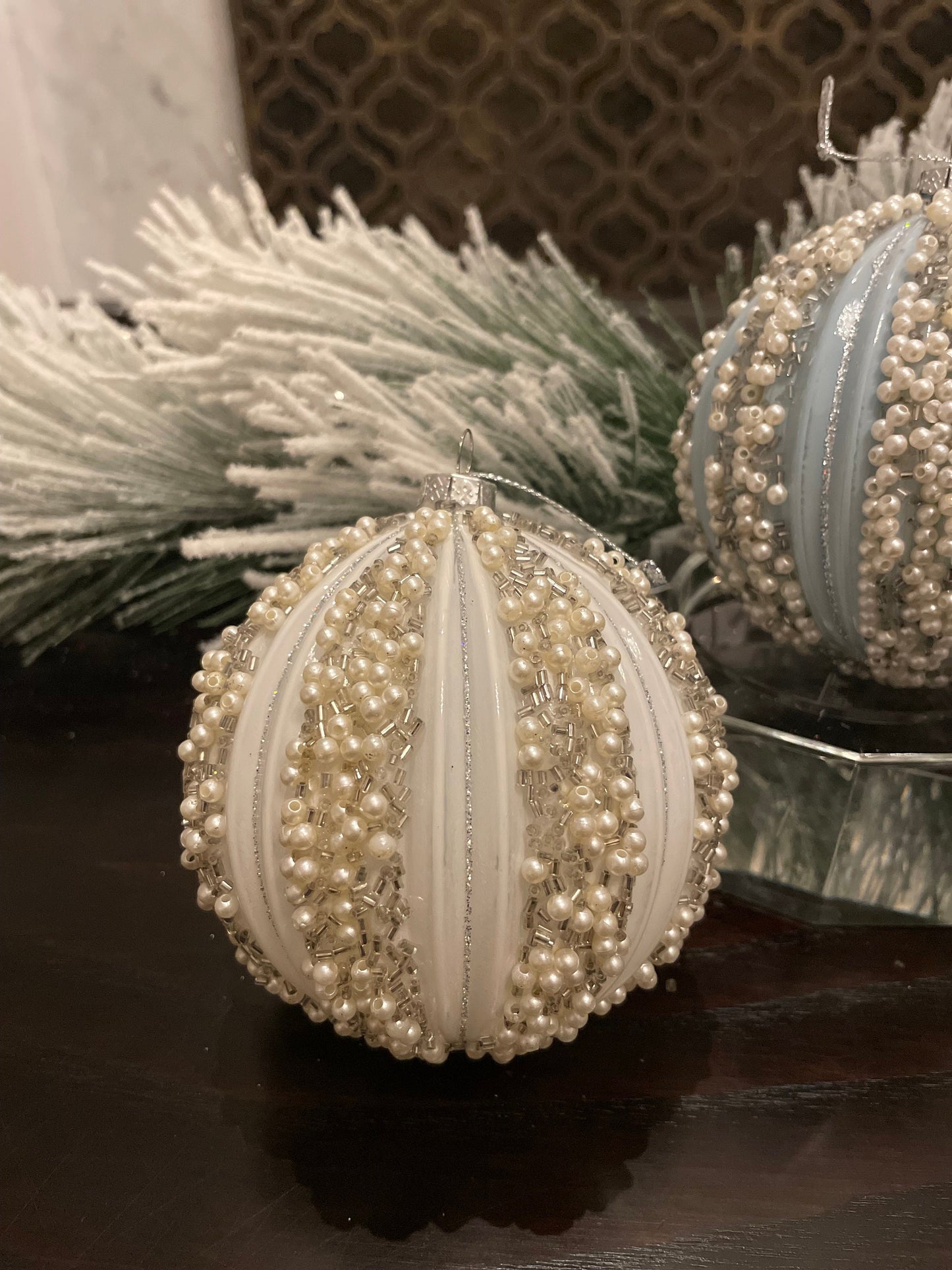 Set of 2. 4" Beaded ball ornament. White and blue.