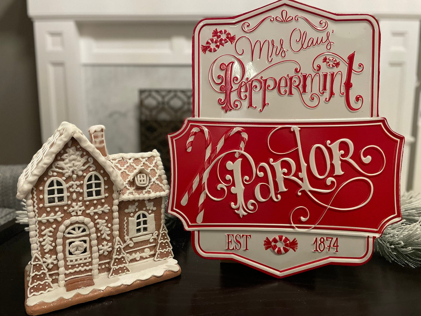 21.75” Peppermint parlor embossed metal wall art.