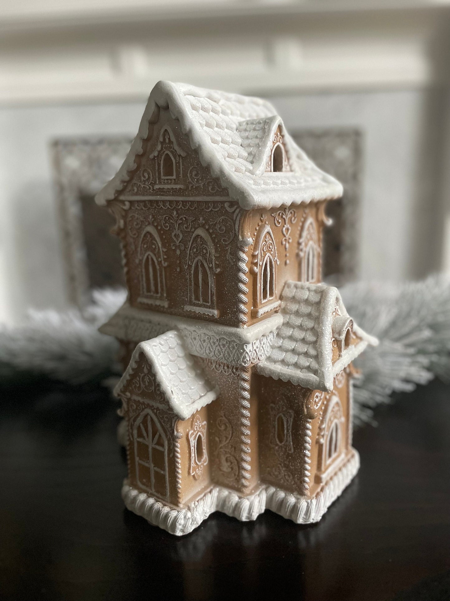 14”H X 9.5”W X 8” D. Gingerbread lighted house.