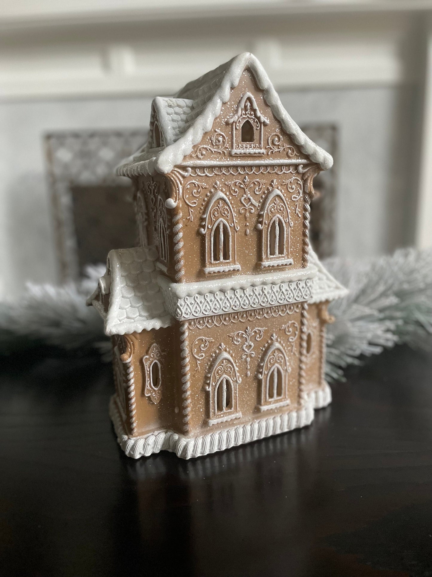 14”H X 9.5”W X 8” D. Gingerbread lighted house.