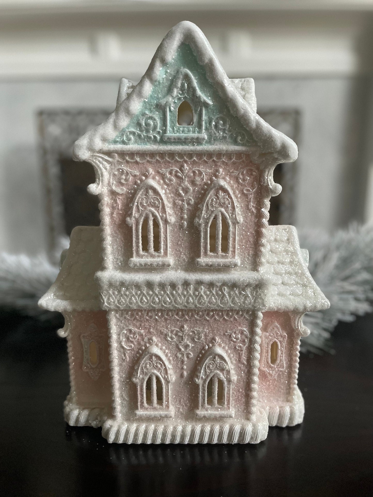 14”H x 9.5”W x 8” D. Gingerbread lighted house. Pink and blue.