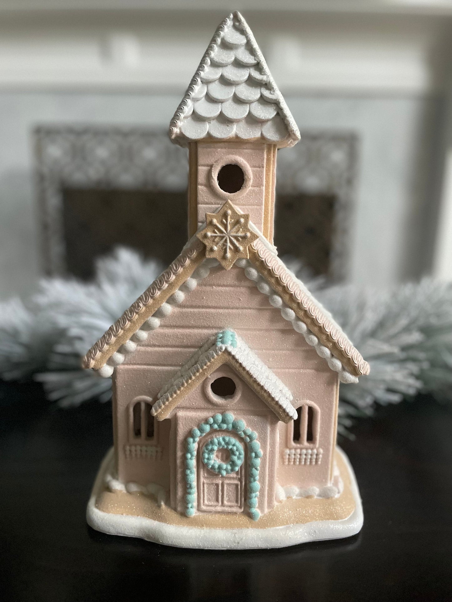 14”H x 8”W x 6” D. Gingerbread lighted church. Pink and blue.
