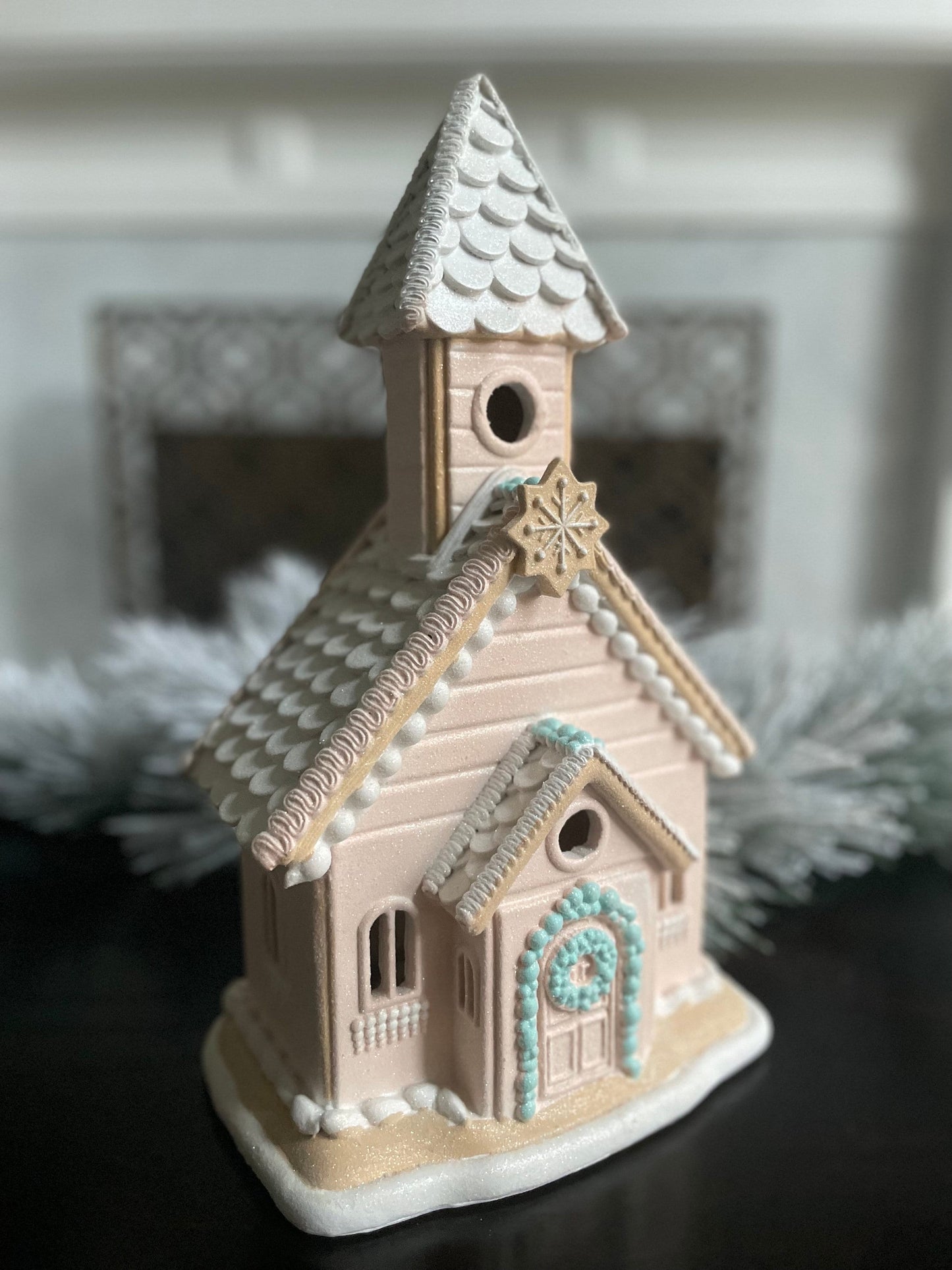 14”H x 8”W x 6” D. Gingerbread lighted church. Pink and blue.