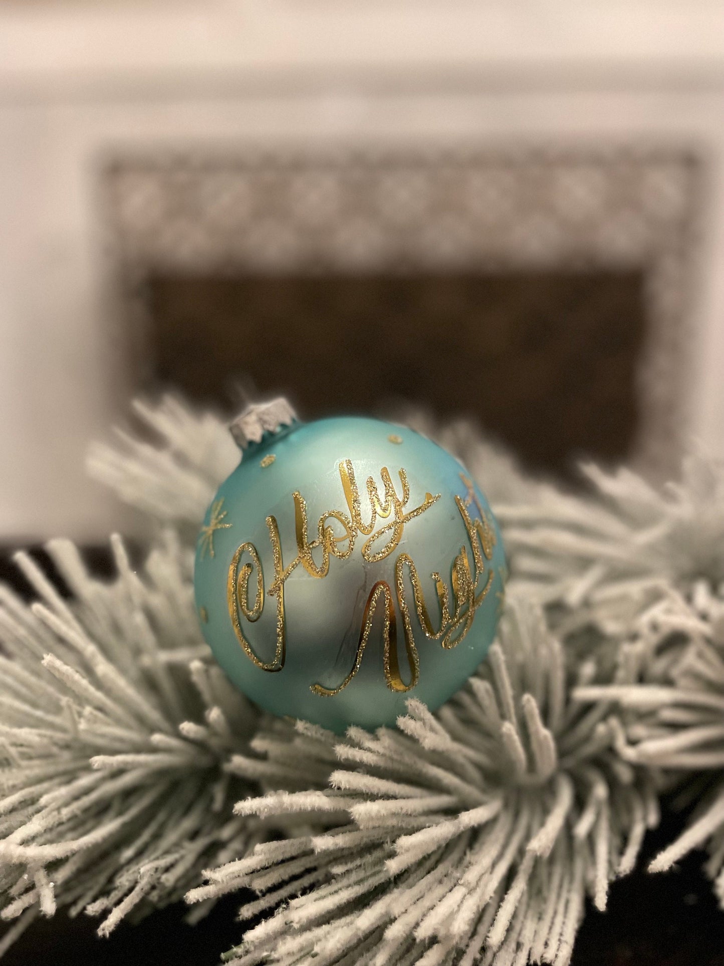 Set of 2. 4” aqua gold silent night and holly night glass ball ornaments. Set of 2.