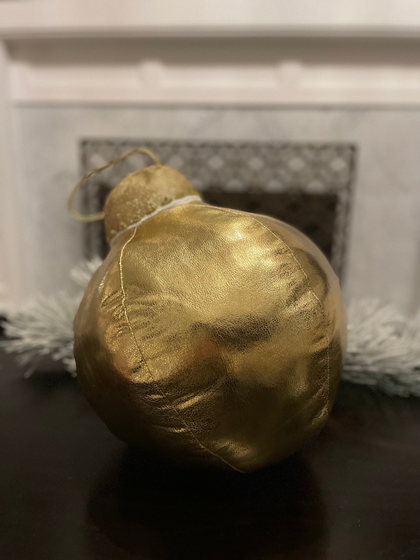 15” H x 10” W gold tabletop ornament/ under the tree ornament.