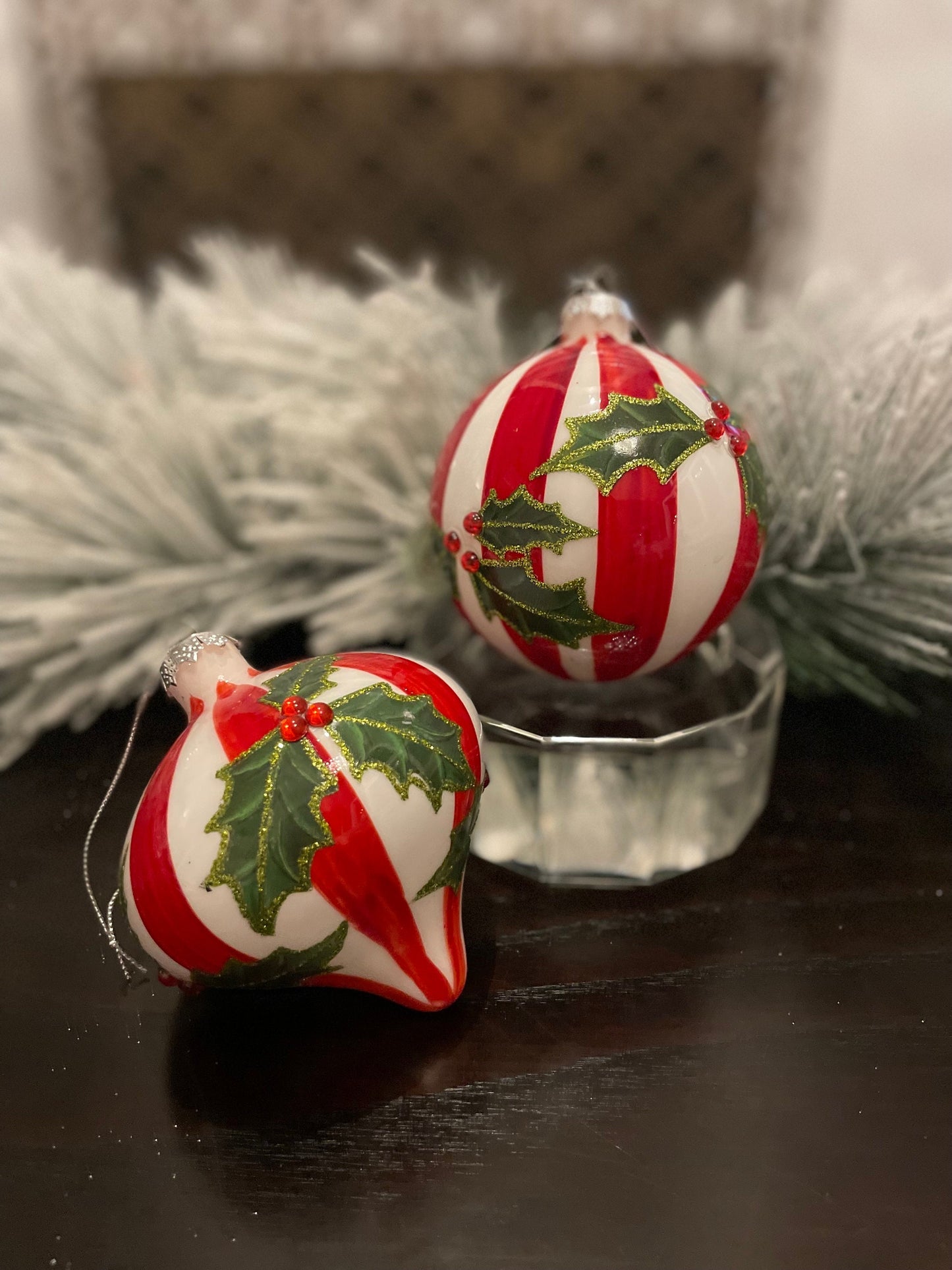 Set of 2. 4” glass stripe and holly ball and onion ornament.
