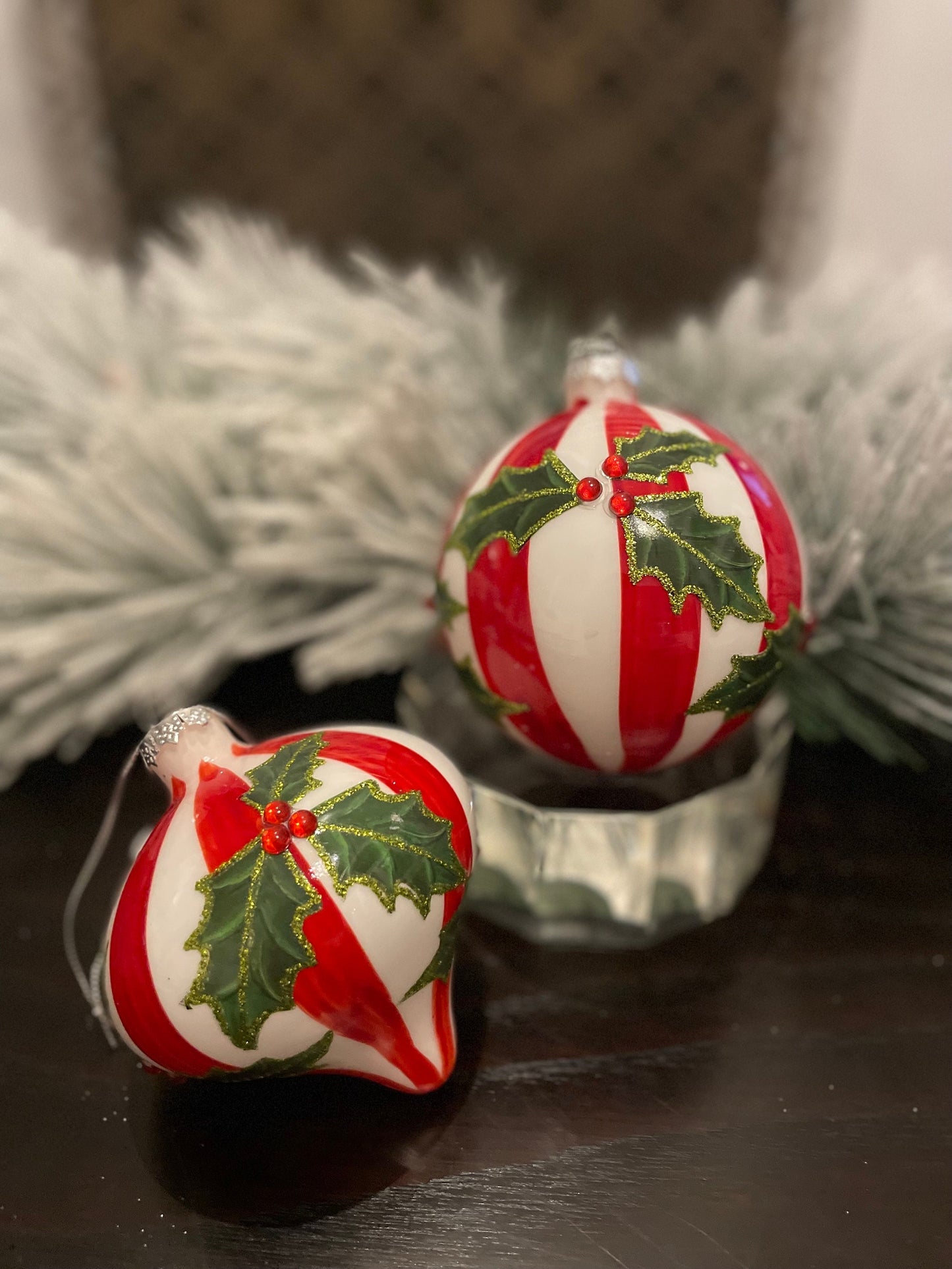 Set of 2. 4” glass stripe and holly ball and onion ornament.