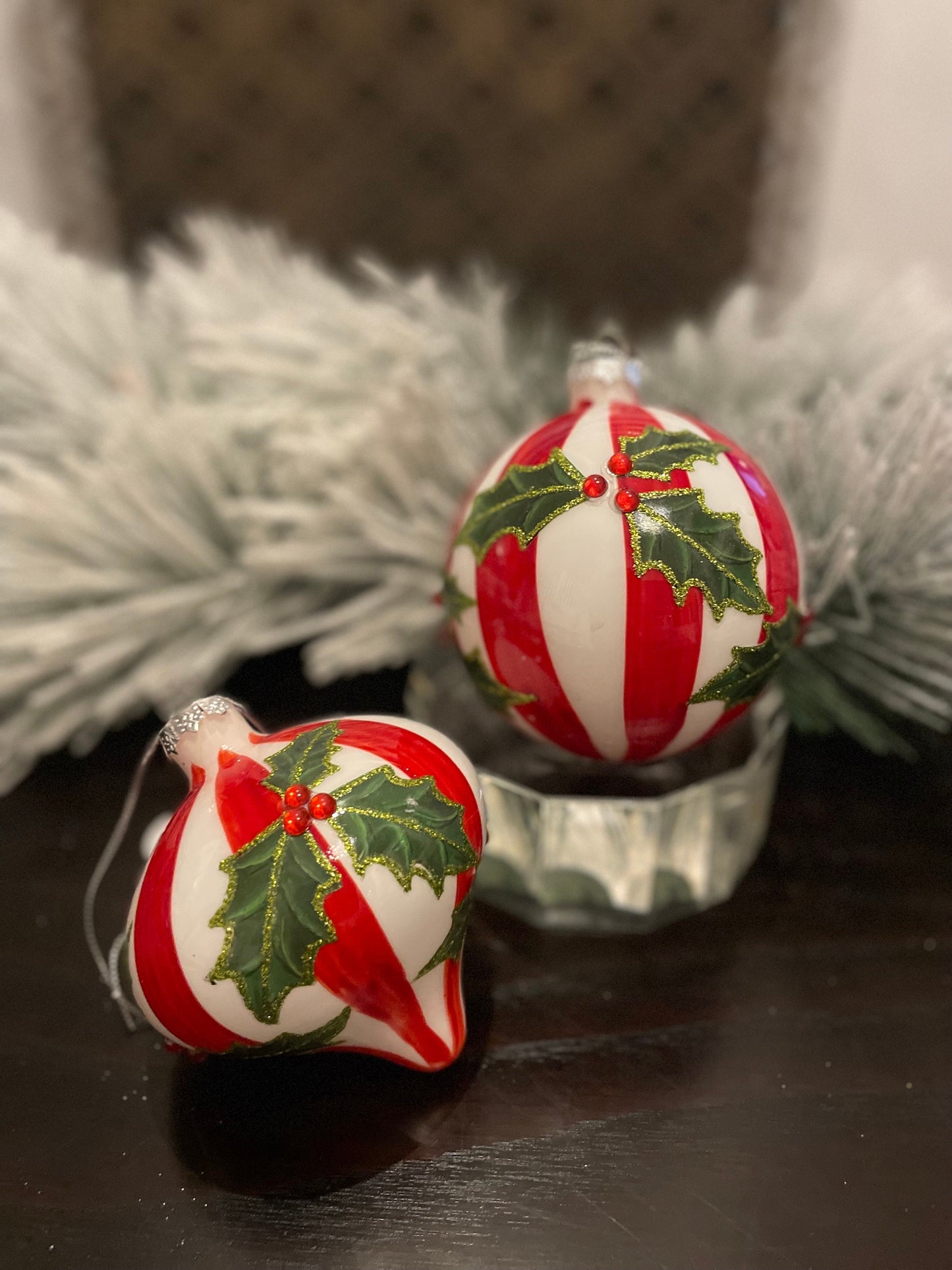 Set of 2. 4” glass stripe and holly ball and onion ornament.