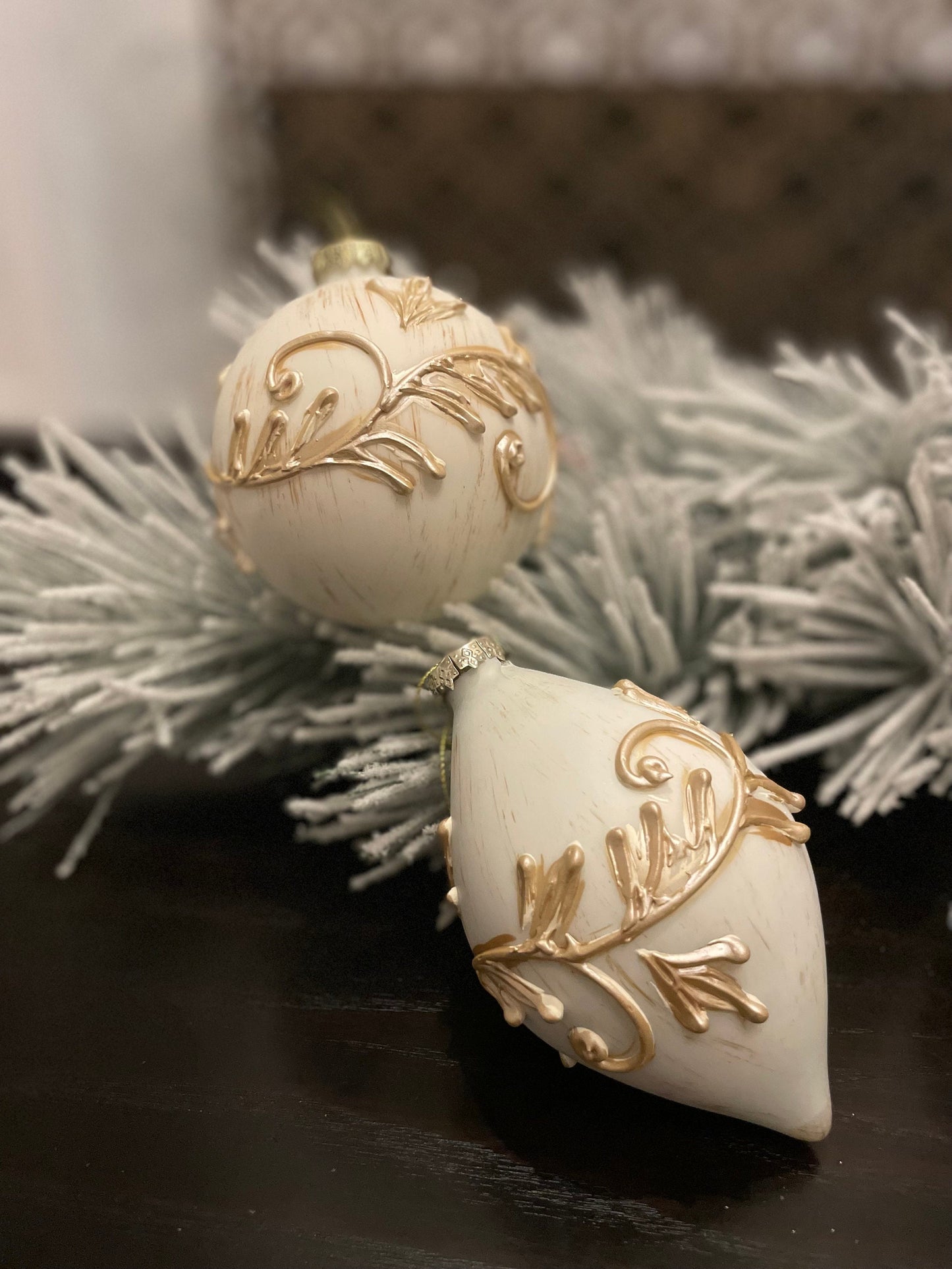Set of 2. 4”-5” glass and resin acanthus ball and finial ornament.