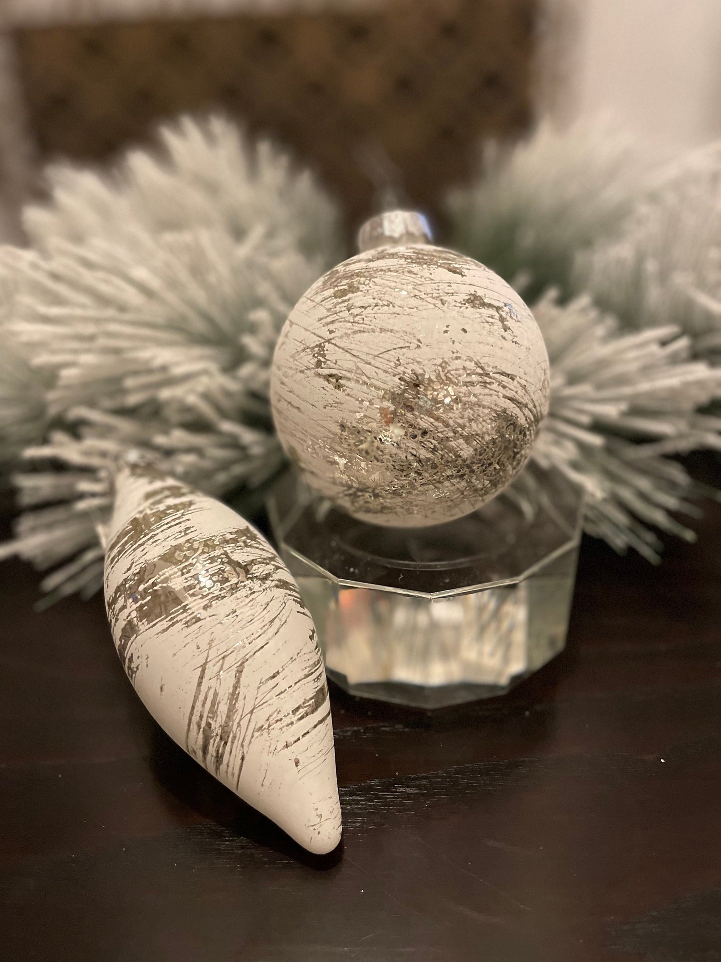 Set of 2. 4”-6” glass whitewash mercury ball and finial.