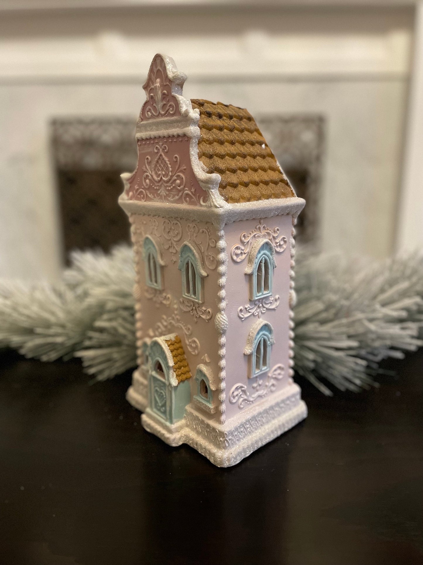 13” Gingerbread lighted house. Pastel pink and blue.