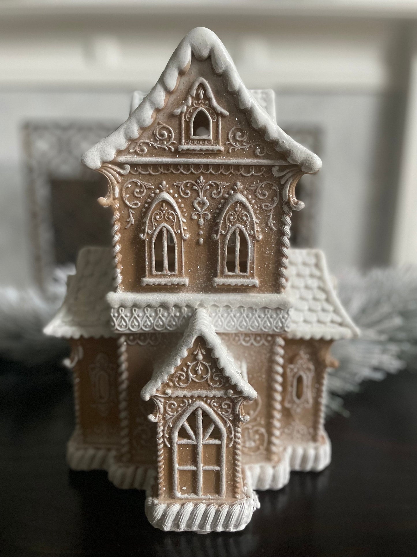 14”H X 9.5”W X 8” D. Gingerbread lighted house.