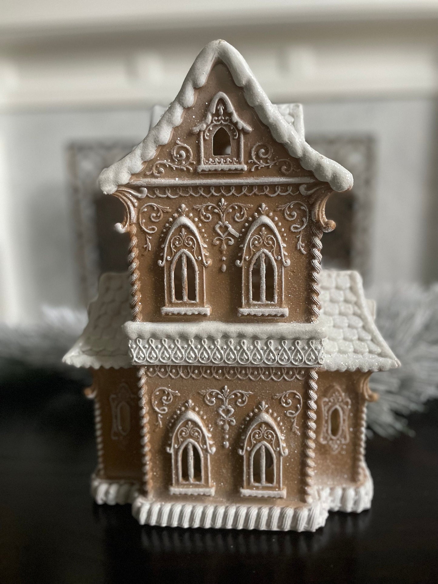 14”H X 9.5”W X 8” D. Gingerbread lighted house.