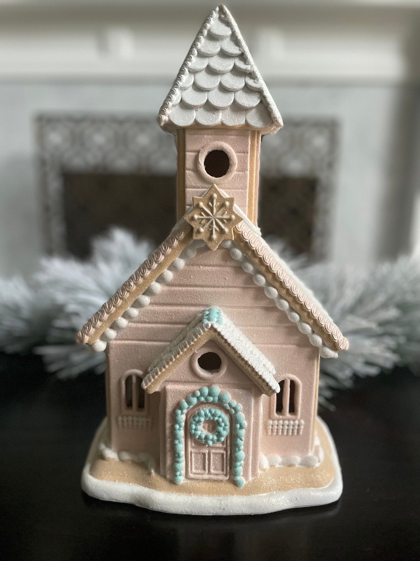 14”H x 8”W x 6” D. Gingerbread lighted church. Pink and blue.