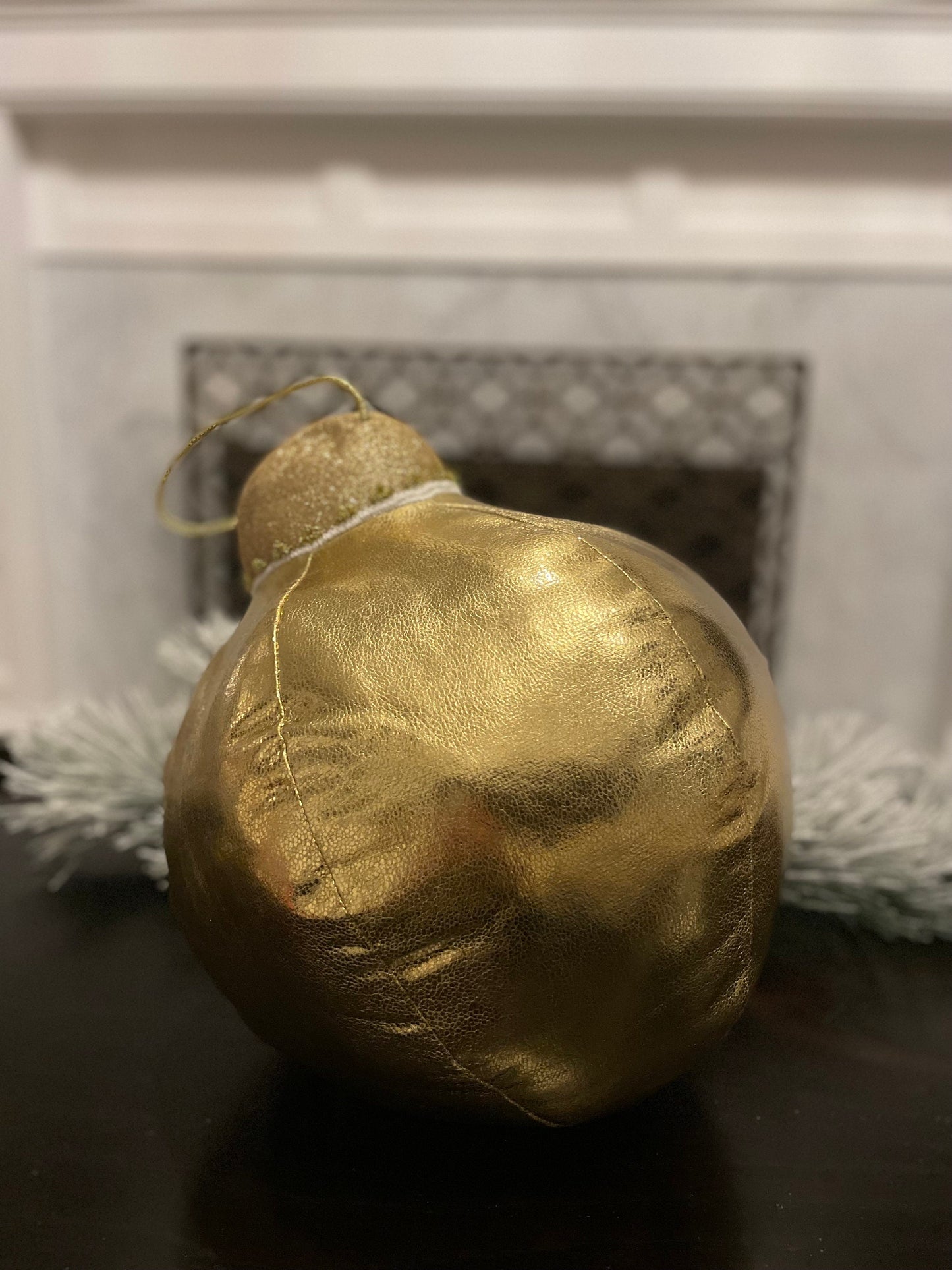 15” H x 10” W gold tabletop ornament/ under the tree ornament.