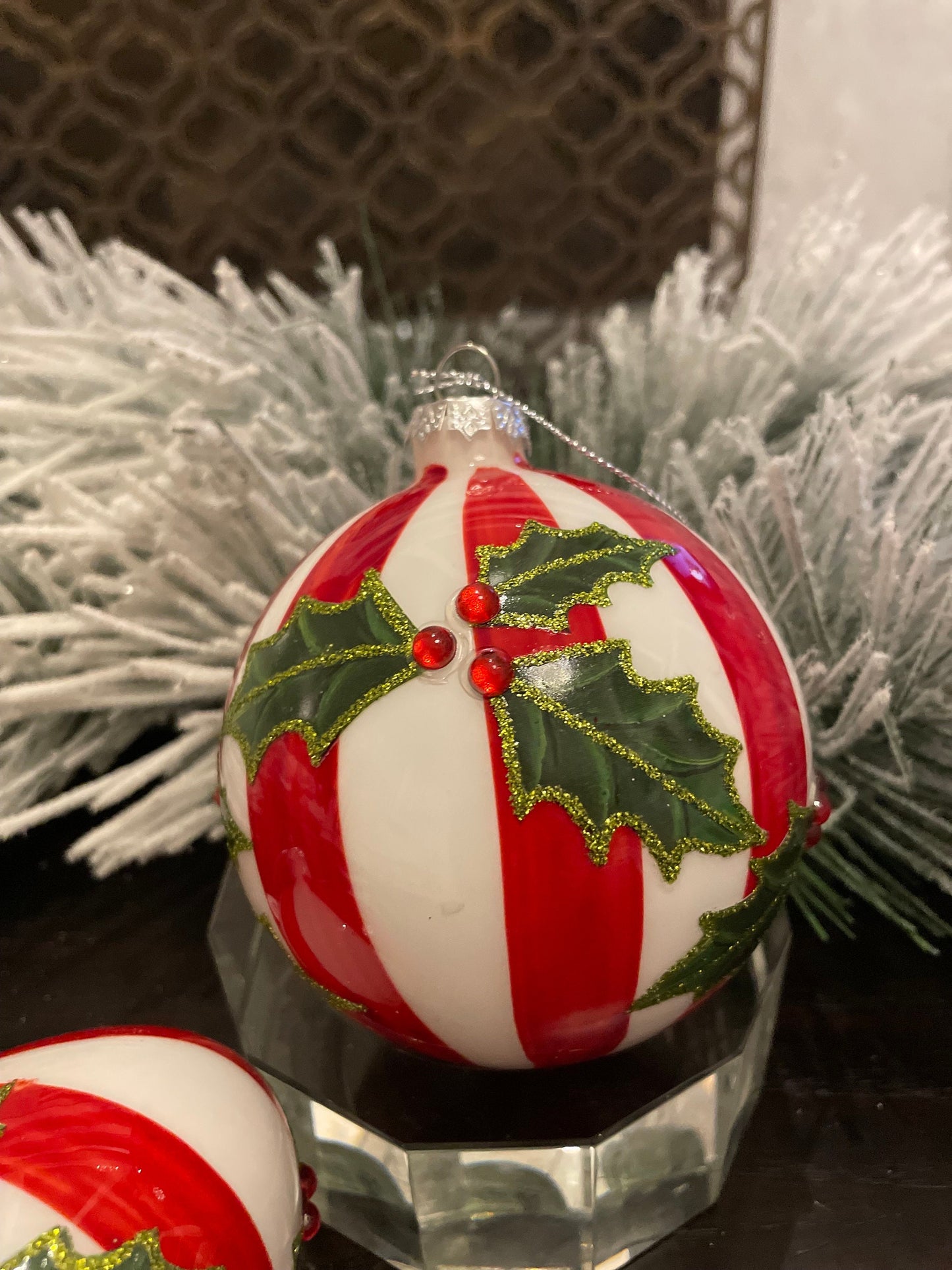 Set of 2. 4” glass stripe and holly ball and onion ornament.