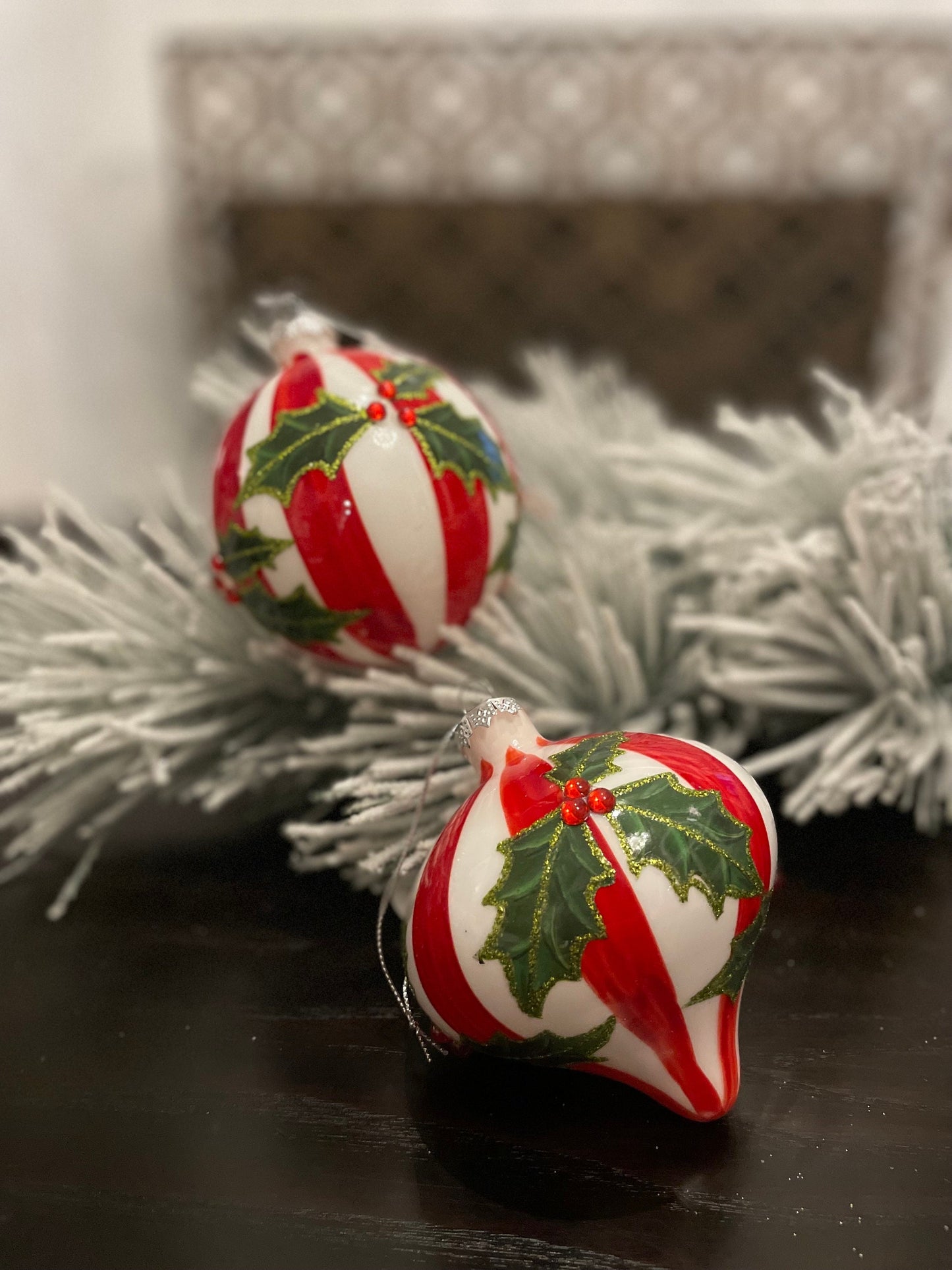 Set of 2. 4” glass stripe and holly ball and onion ornament.