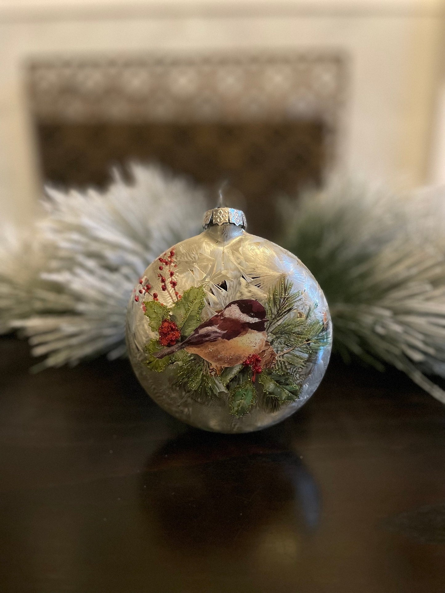 Set of 2. 5.5" Glass chickadee on pine/ berries disc ornament. So beautiful!