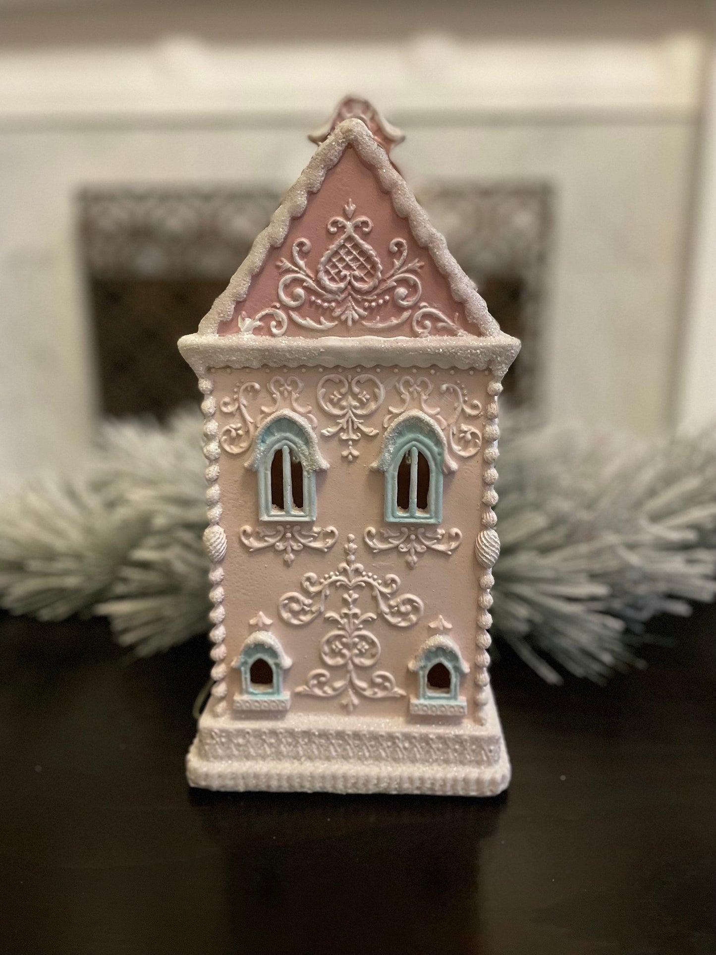 13” Gingerbread lighted house. Pastel pink and blue.
