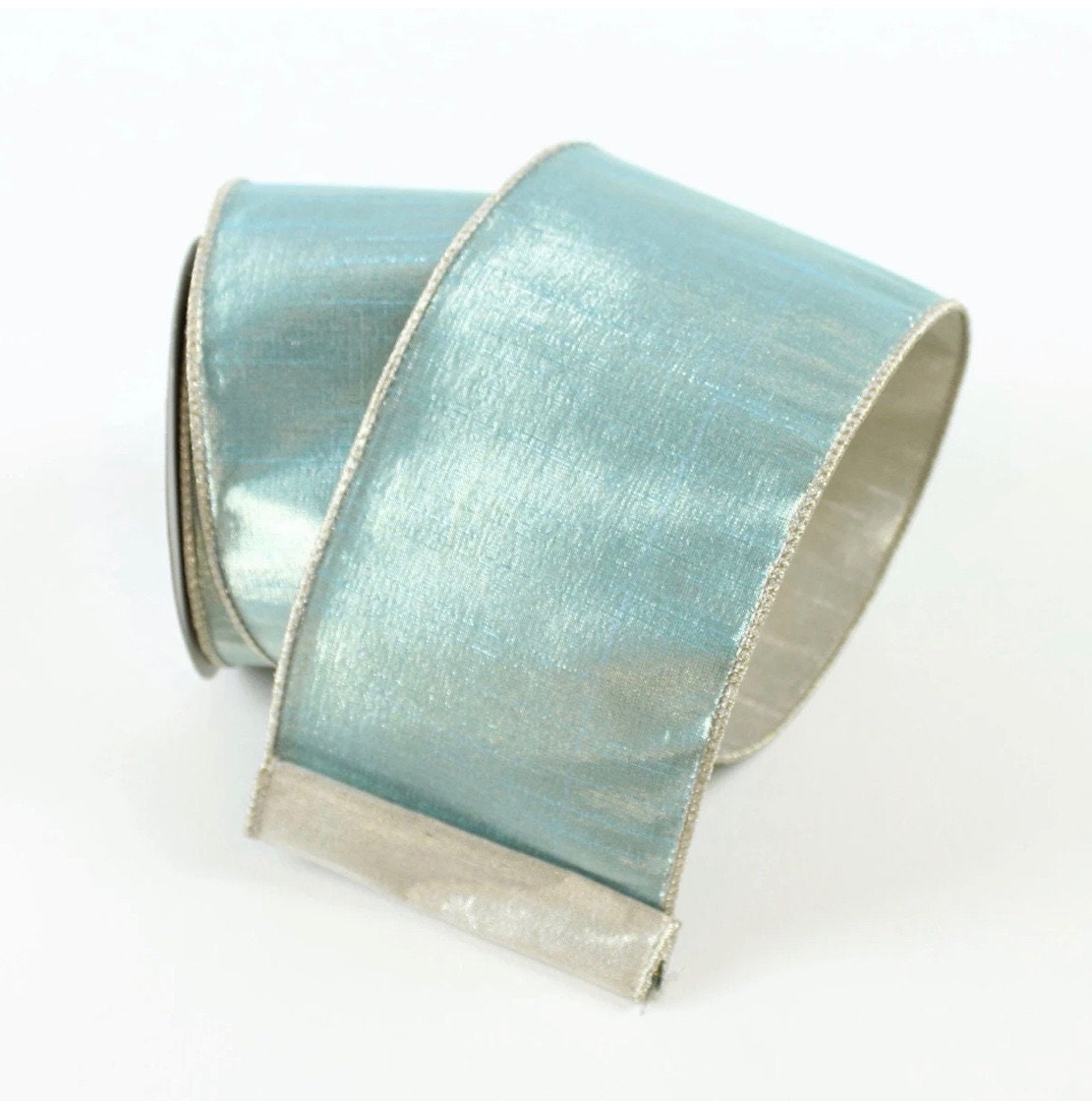 4"x 10 yard two tone light blue platinum, designer ribbon. Farrisilk. Wired.