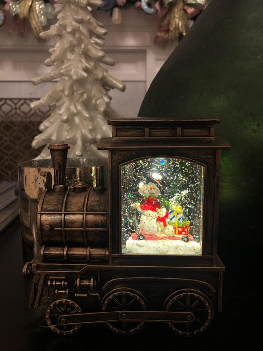 6.75" snowman in musical lighted water train*