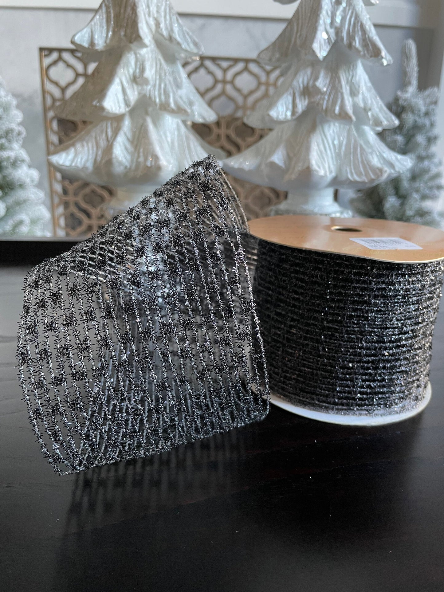 Designer ribbon, black metallic net 4” x 10 yards.*