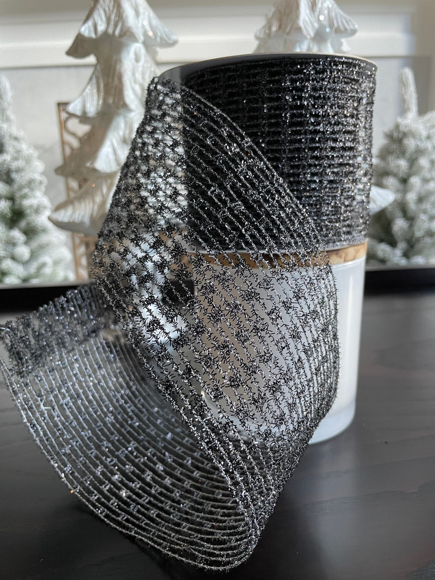 Designer ribbon, black metallic net 4” x 10 yards.*