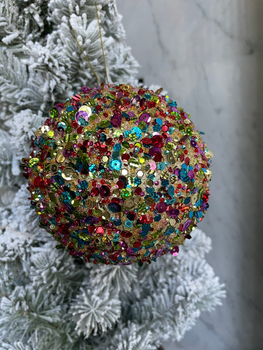 4.5” sequin ball ornament, red main color with multiple secondary colors.