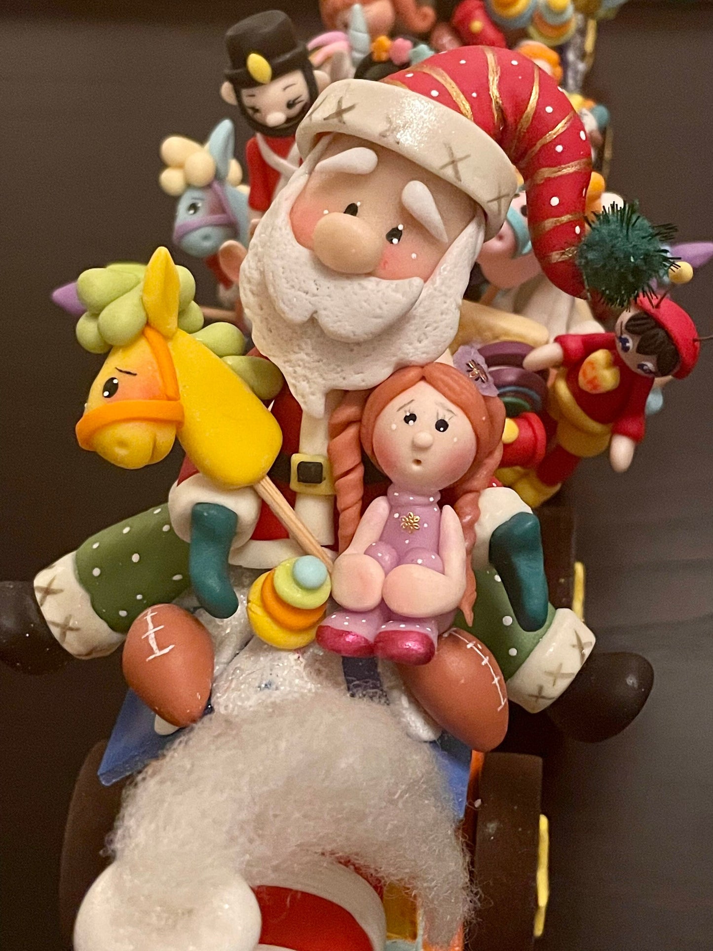 Train full of toys with Santa. Polymer clay. Handmade. Christmas.