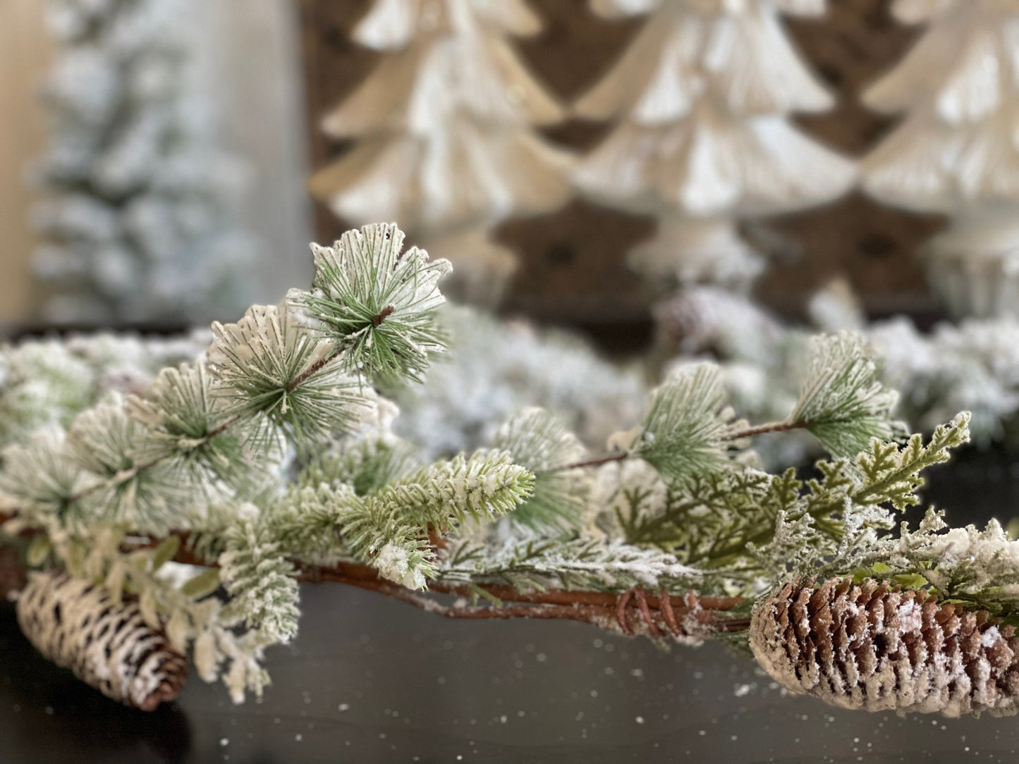 6 ft mixed snow pine cone garland.