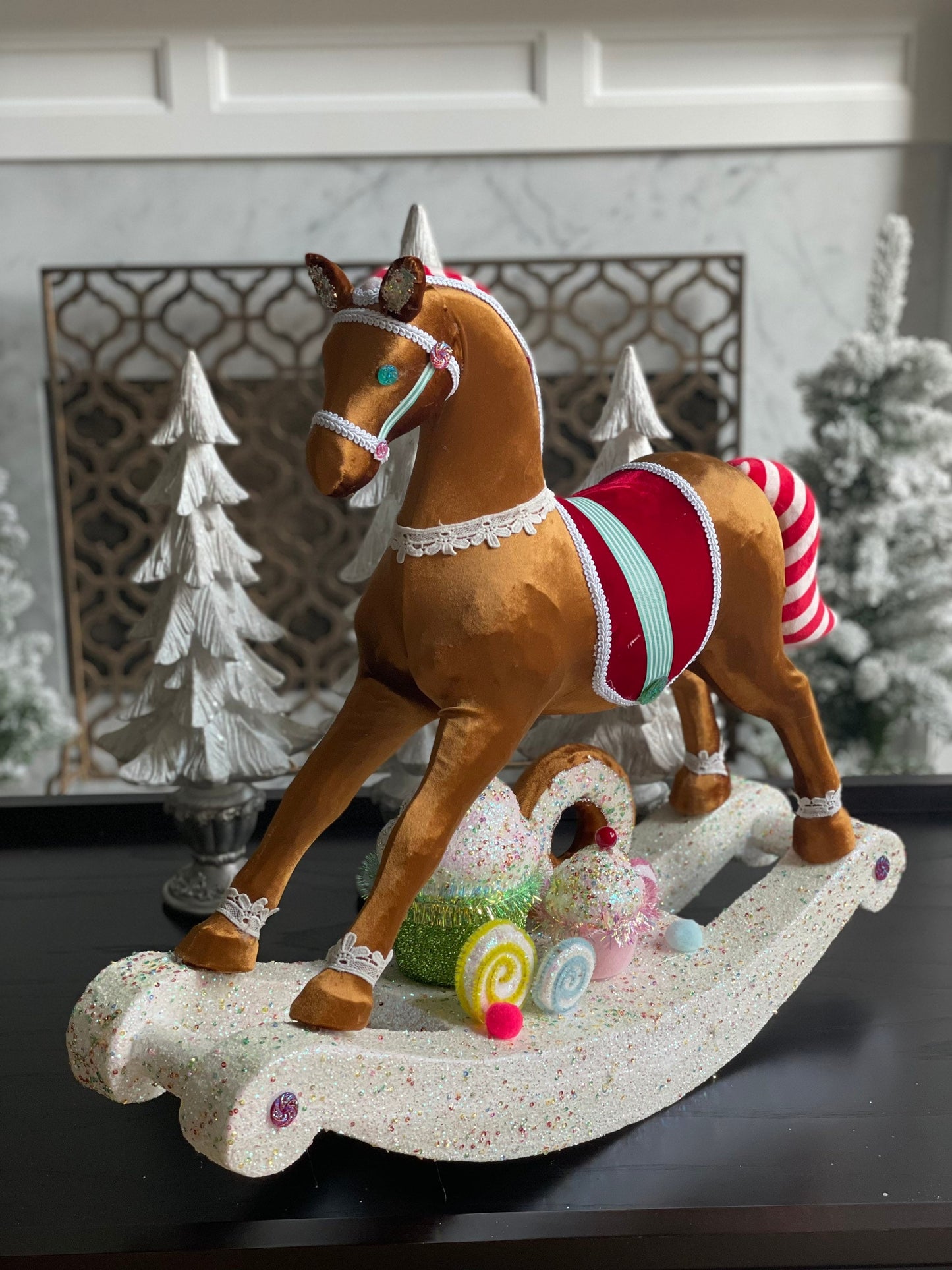 23”Hx 27” W. Rocking horse with cupcakes and donuts. One rocking horse.