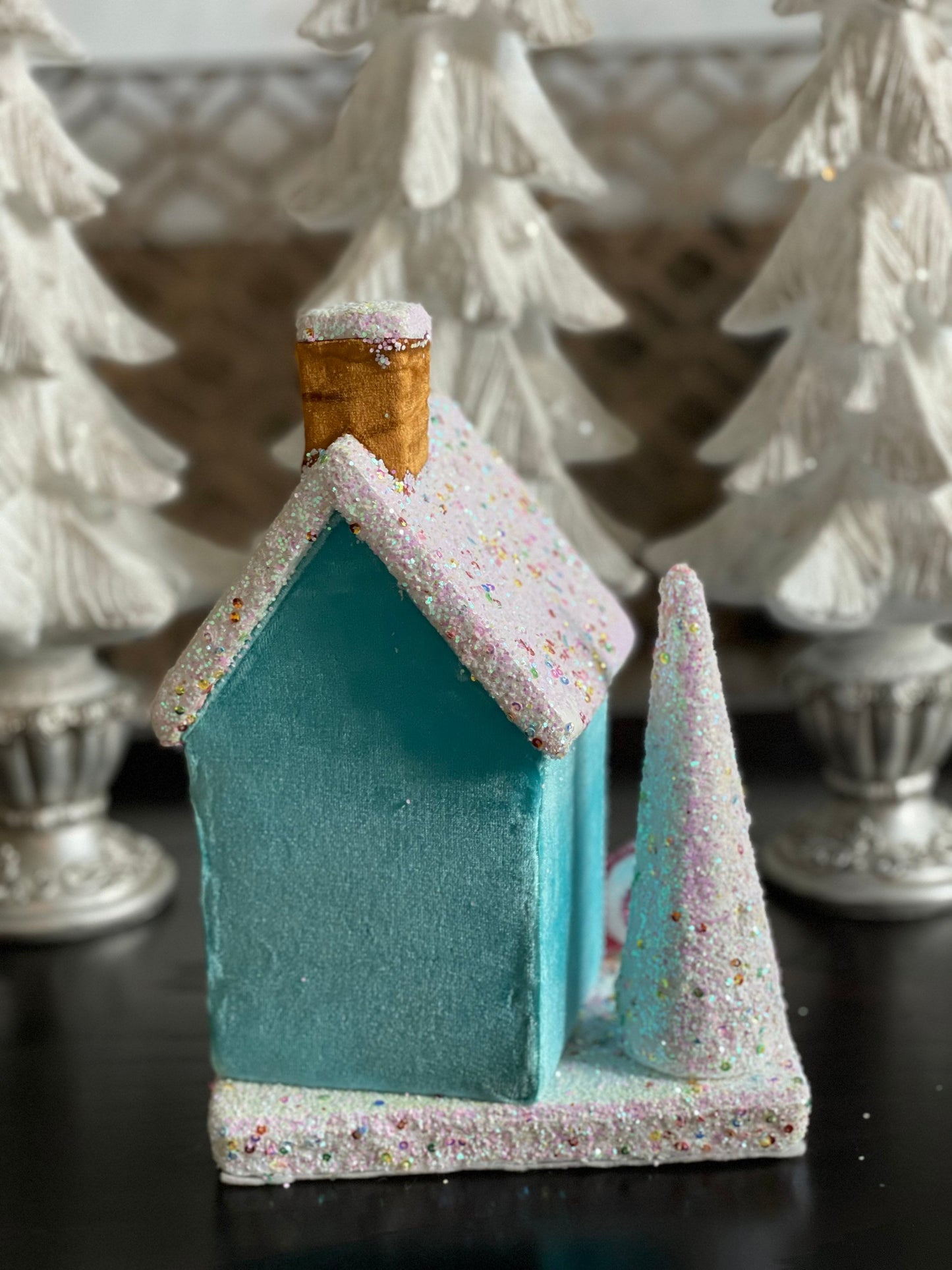 11” Gingerbread house blue with candy and tree. One Candy house.