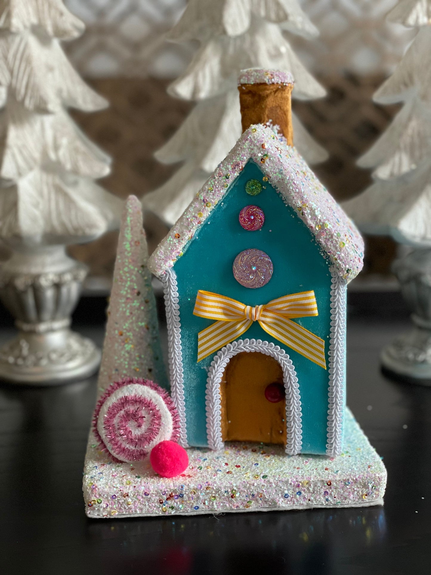 11” Gingerbread house blue with candy and tree. One Candy house.