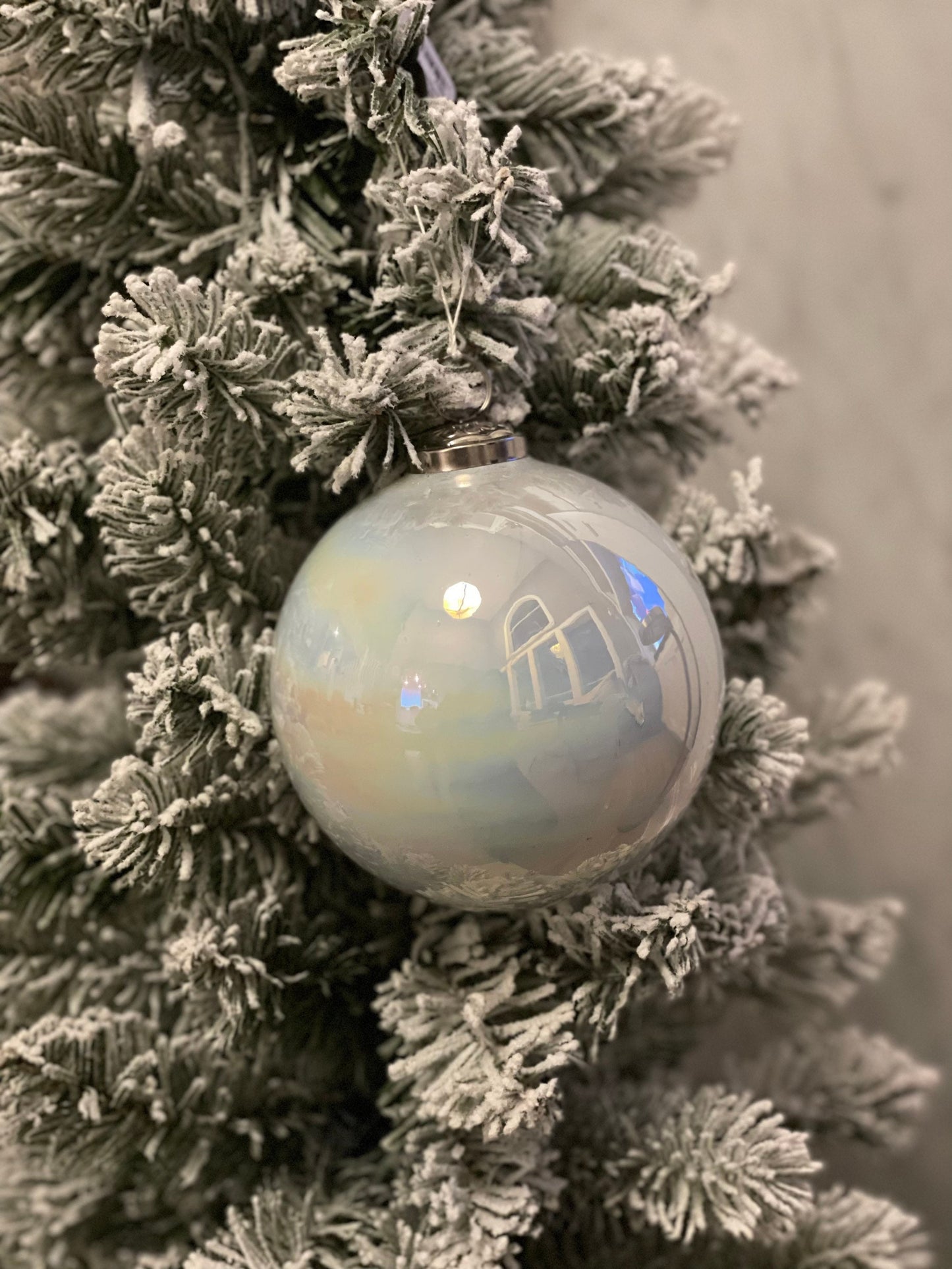 5” glass Iridescent ball ornament.*