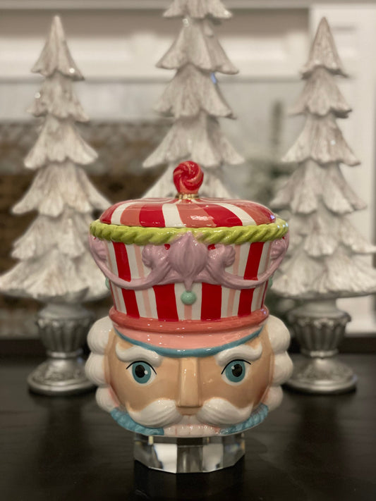 10”h x 8” w. Nutcracker dolomite cookie jar.