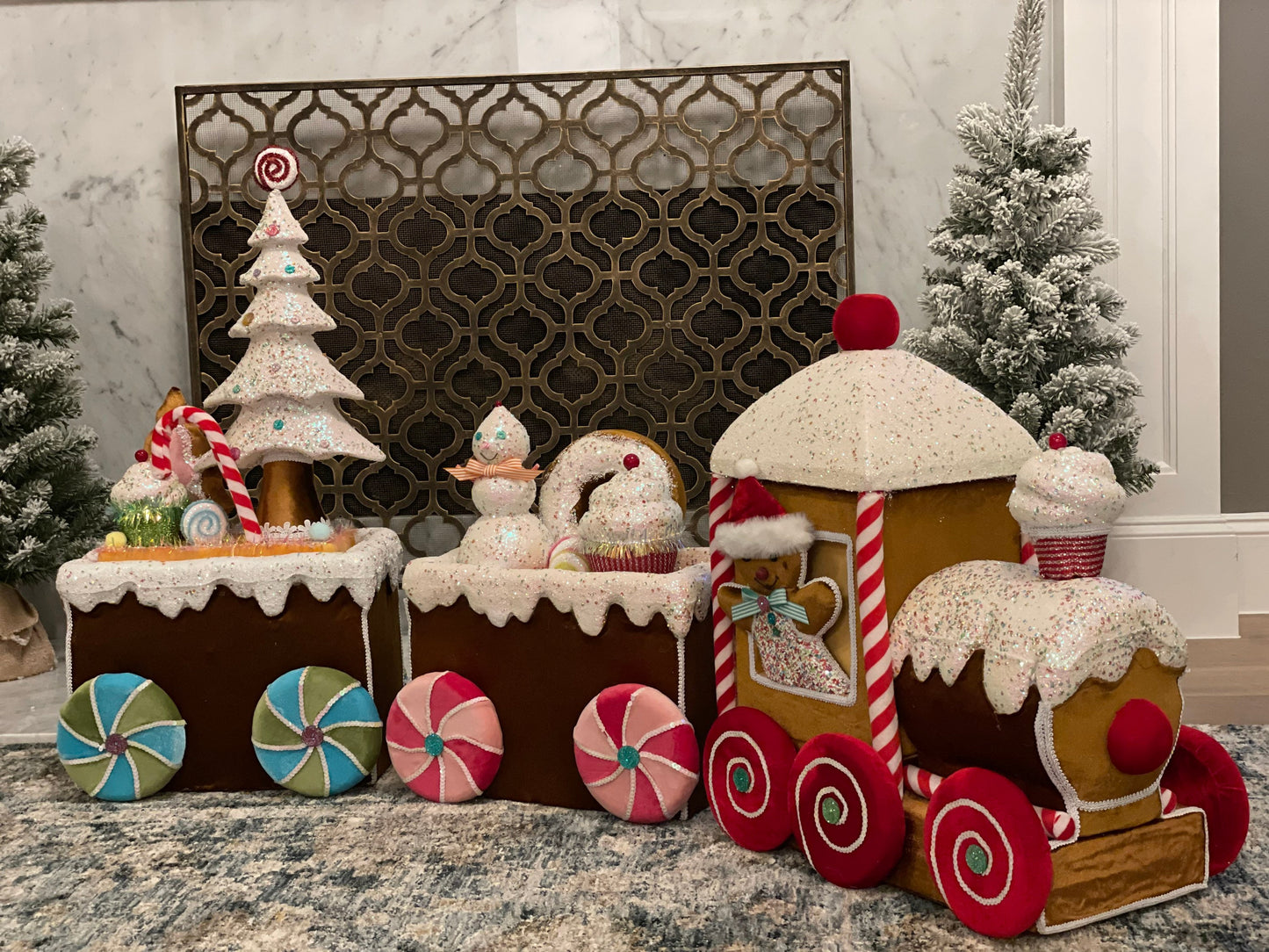 50” Velvet gingerbread candy train with tree, cupcakes, candy and snowman.