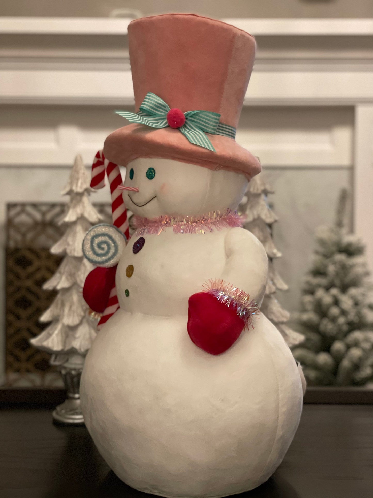 24”h x 13.4” w Snowman with pink hat holding a candy cane. Christmas. Ornament. Tabletop. Display.