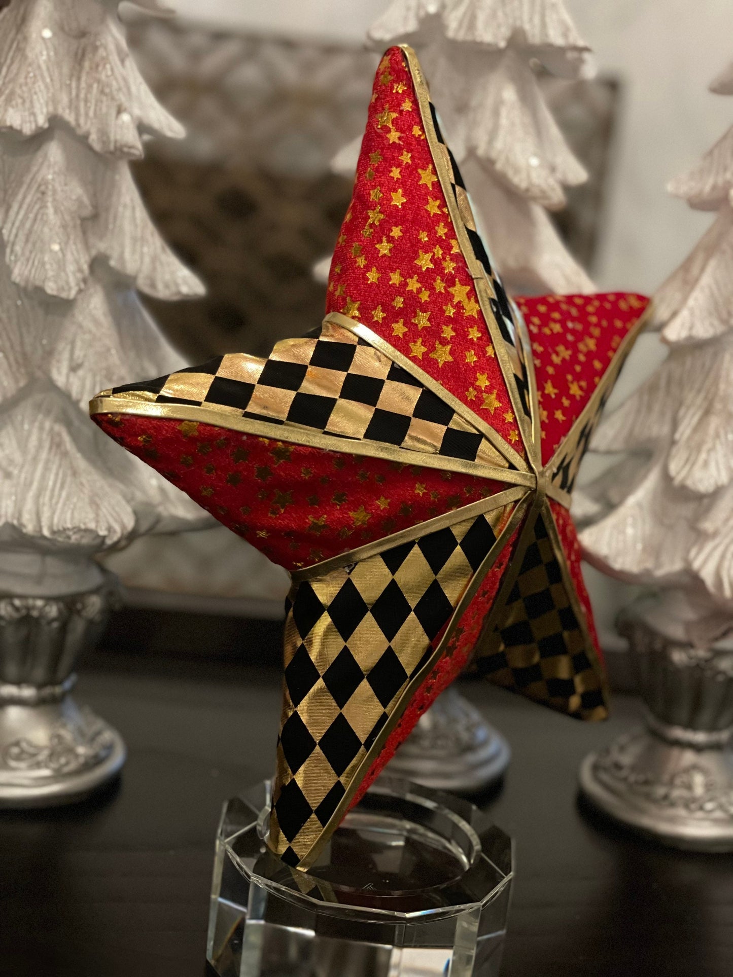 12.5” star ornament. Star checkered red, gold and black.