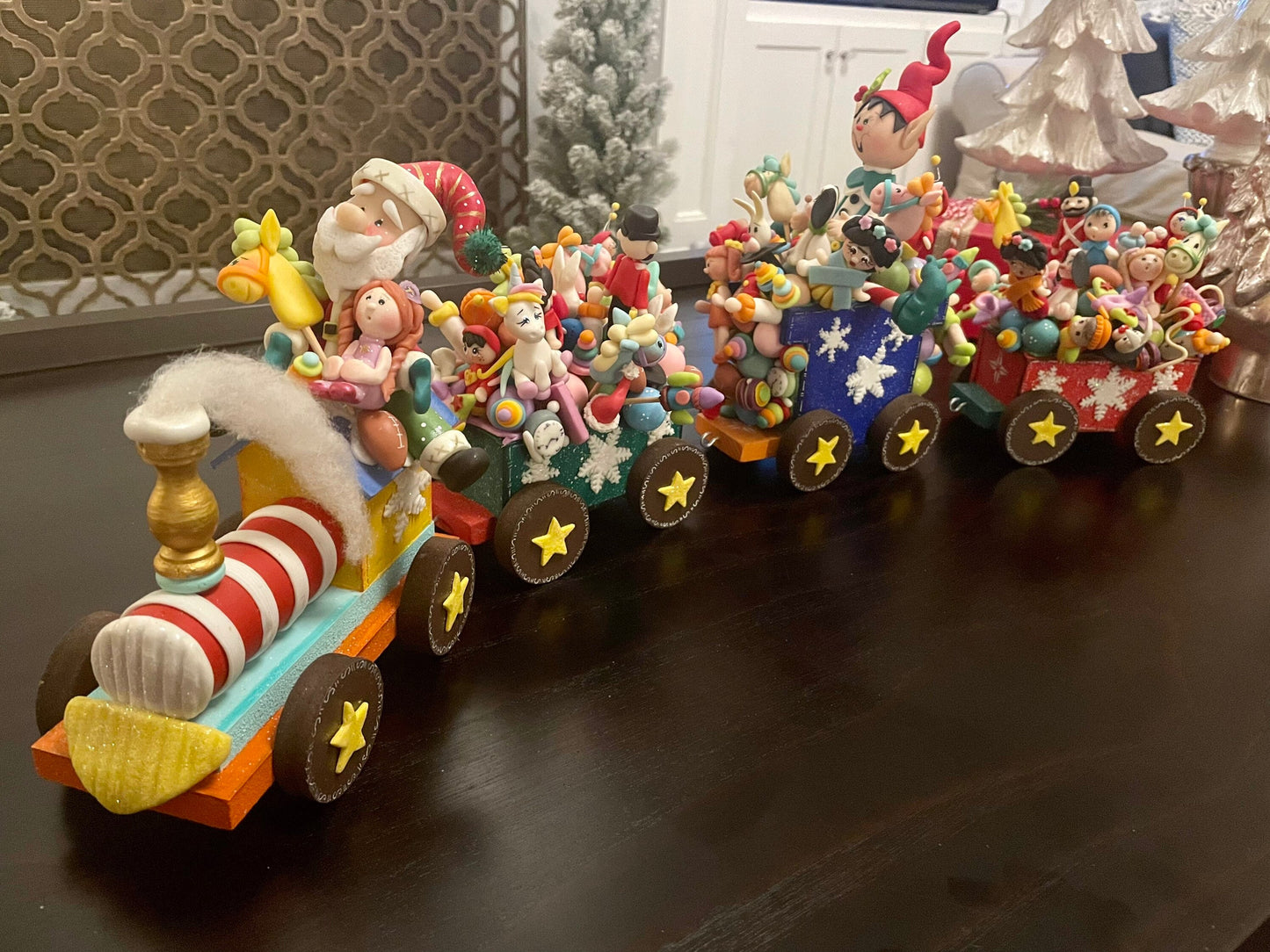 Train full of toys with Santa. Polymer clay. Handmade. Christmas.