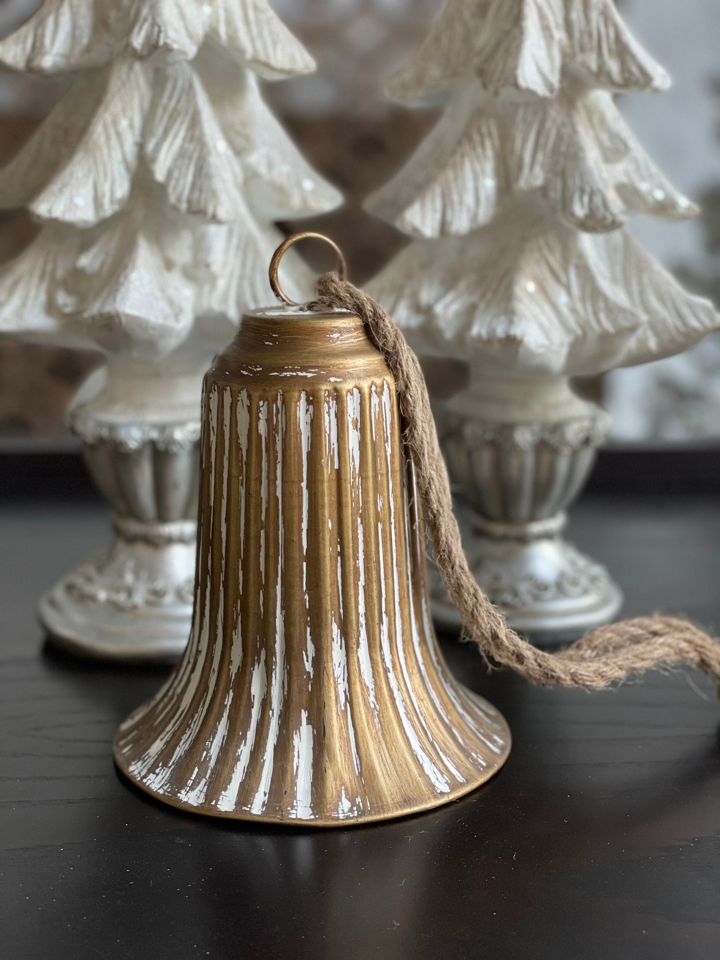 7.5” bell ornament. Iron.