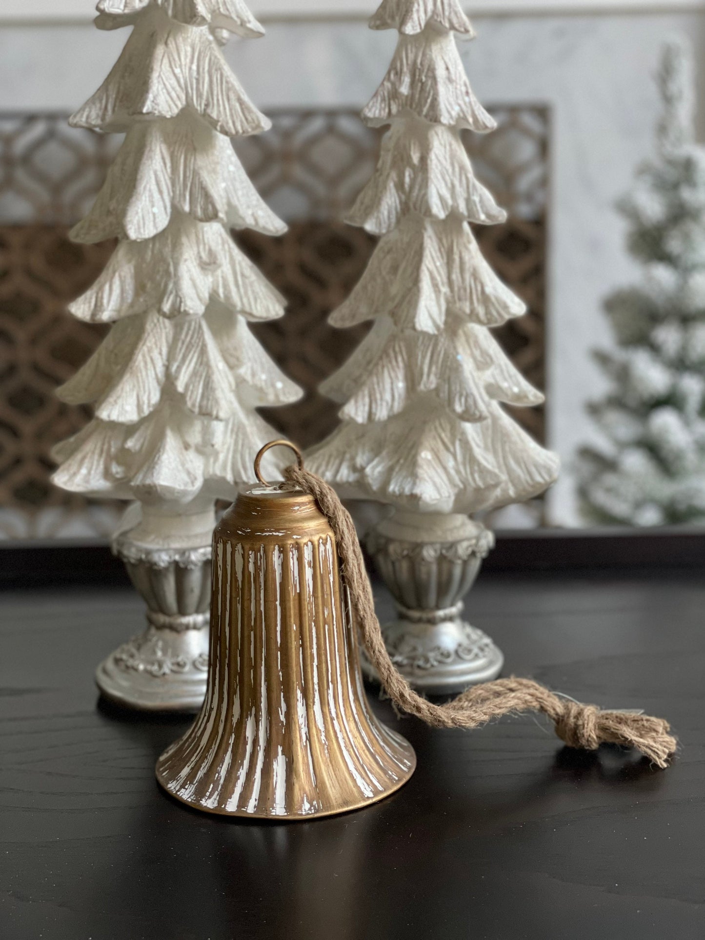 7.5” bell ornament. Iron.
