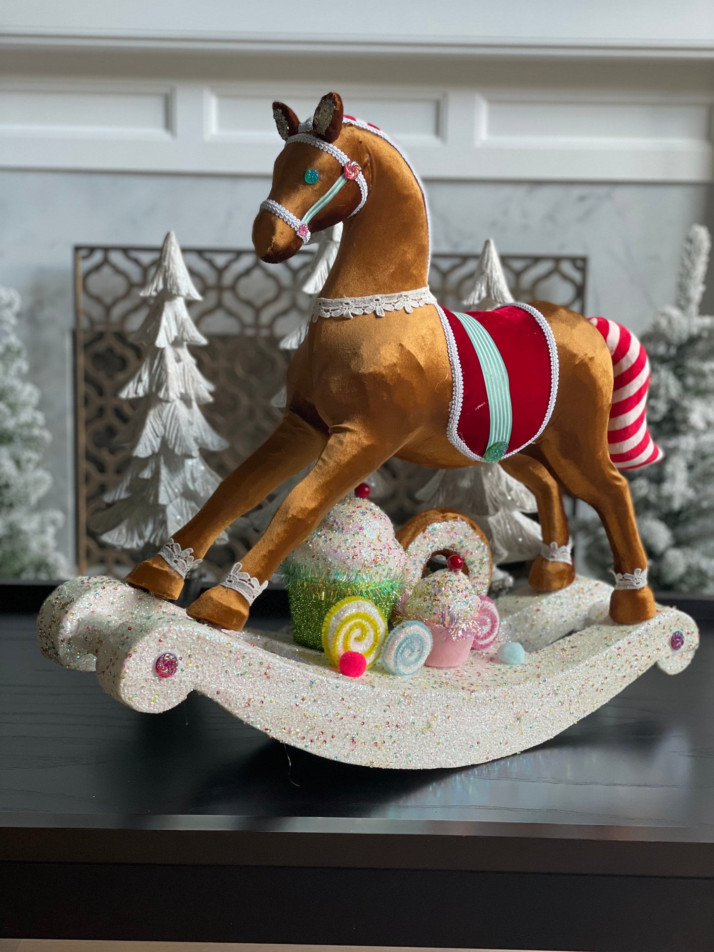 23”Hx 27” W. Rocking horse with cupcakes and donuts. One rocking horse.
