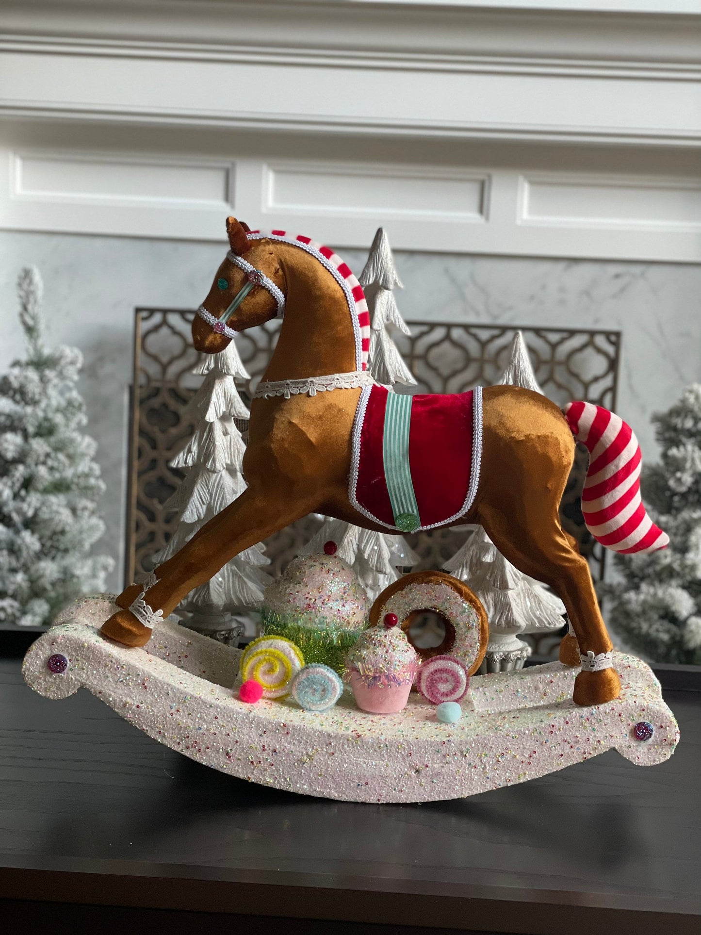 23”Hx 27” W. Rocking horse with cupcakes and donuts. One rocking horse.