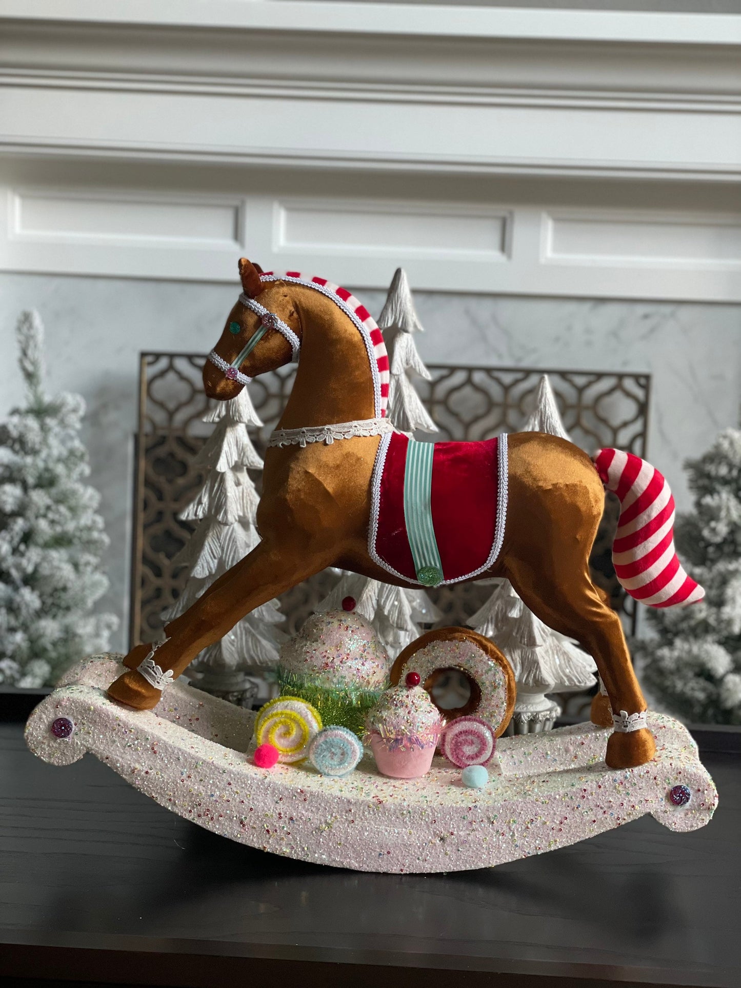 23”Hx 27” W. Rocking horse with cupcakes and donuts. One rocking horse.