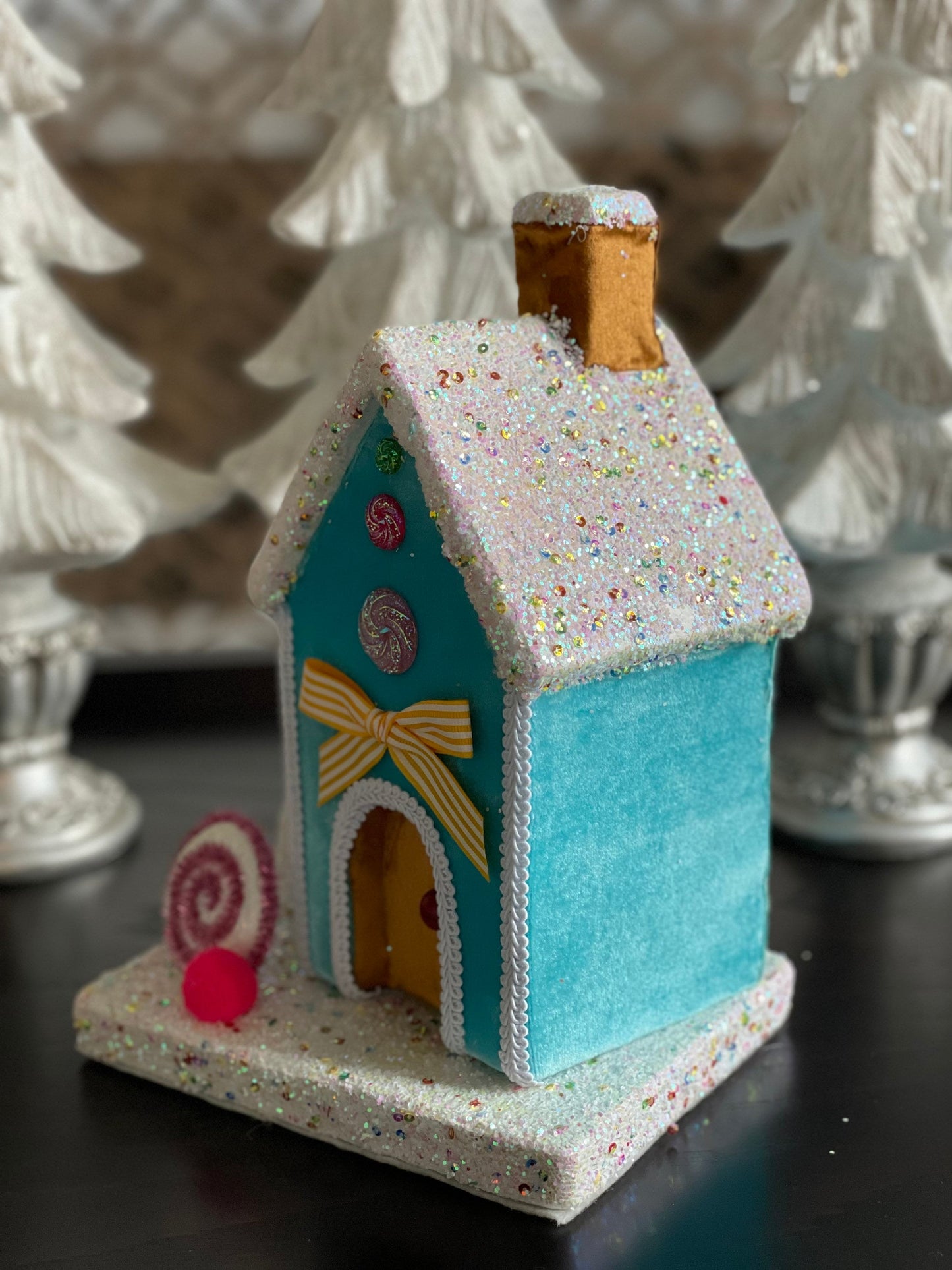 11” Gingerbread house blue with candy and tree. One Candy house.