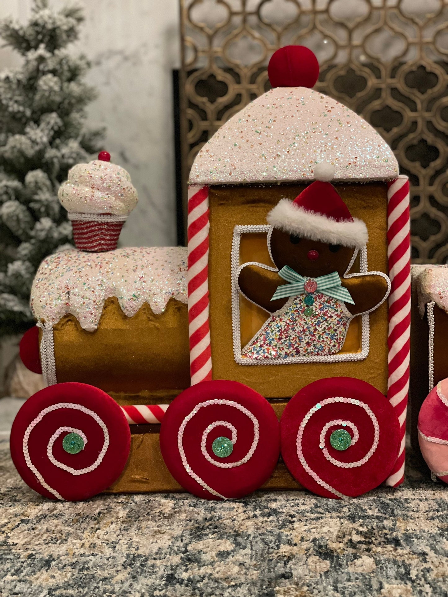 50” Velvet gingerbread candy train with tree, cupcakes, candy and snowman.