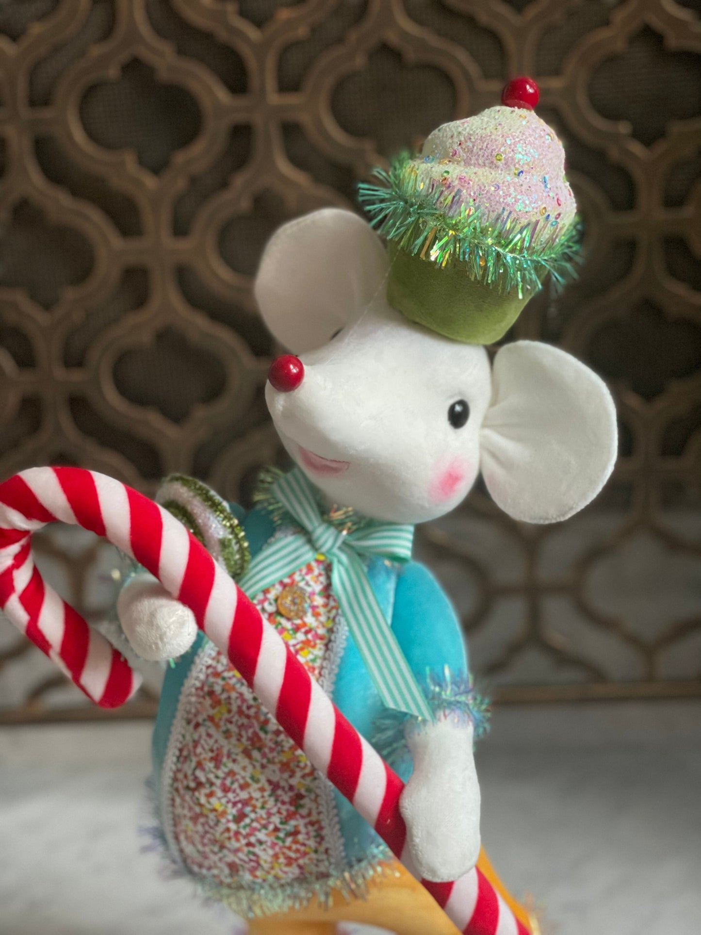 22” H Candy Mouse with blue jacket and yellow pants.