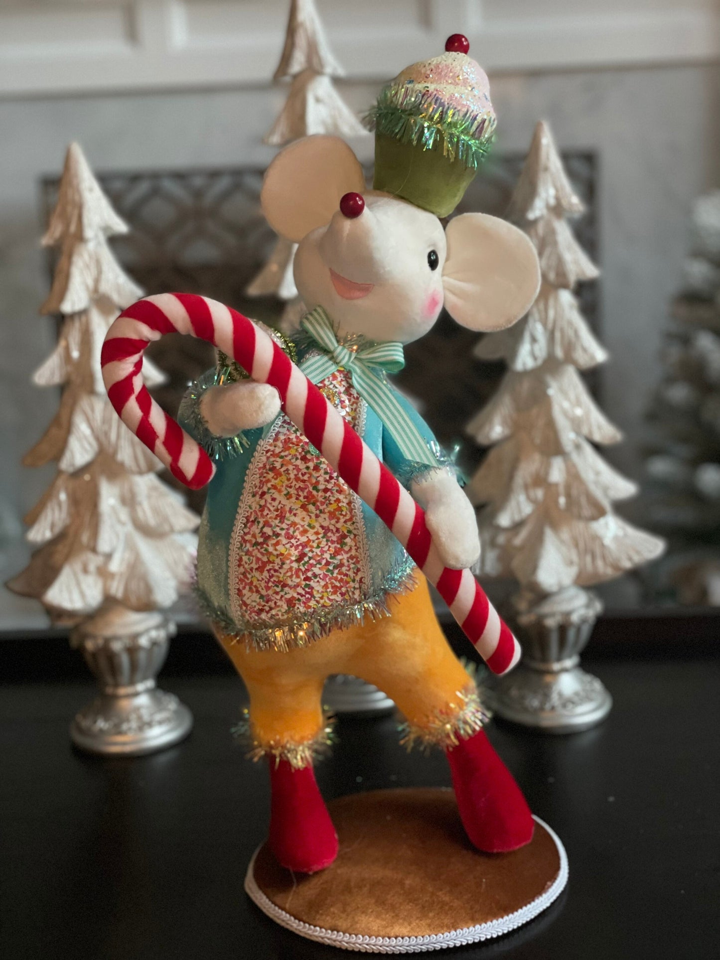 22” H Candy Mouse with blue jacket and yellow pants.