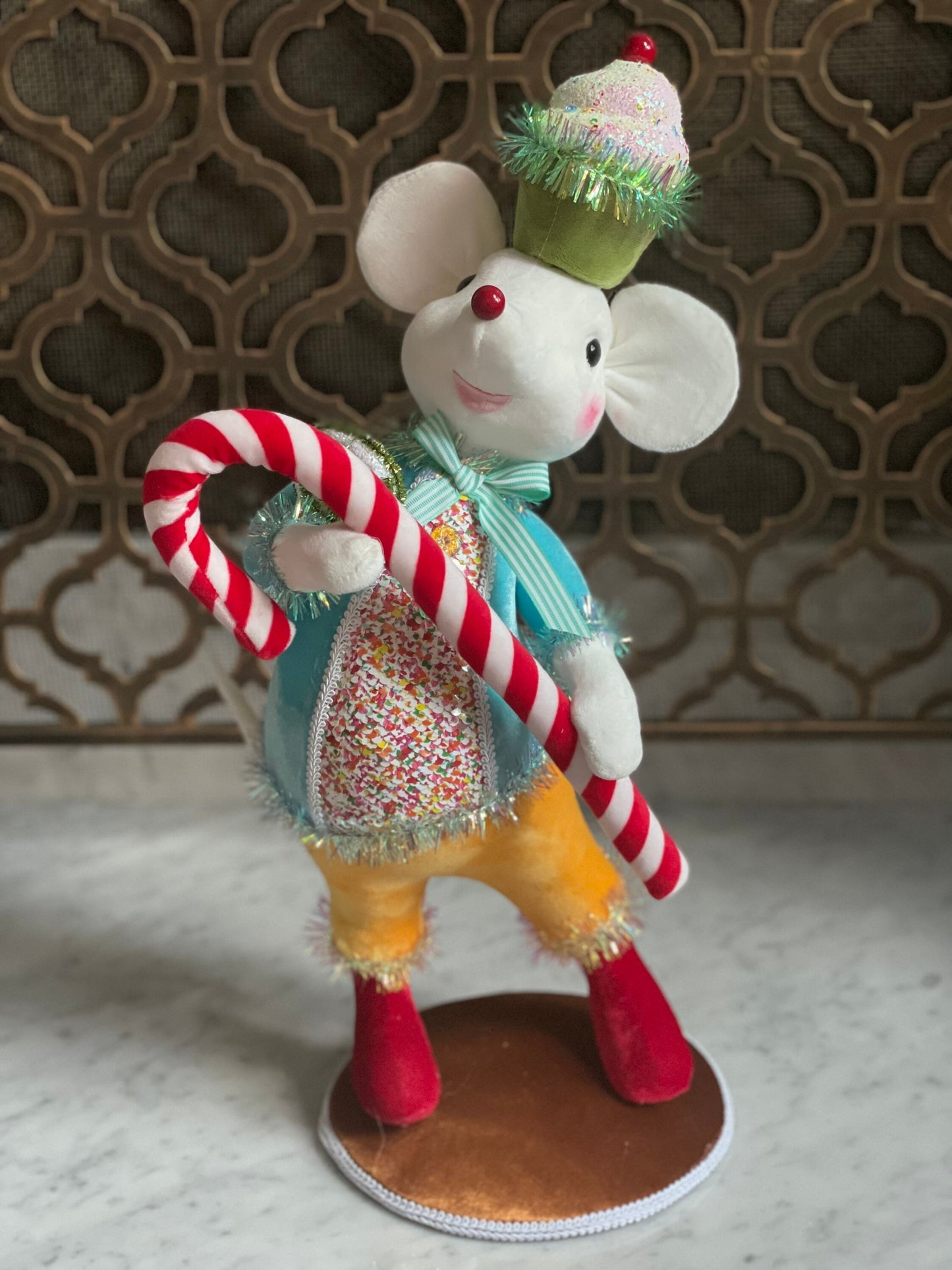 22” H Candy Mouse with blue jacket and yellow pants.